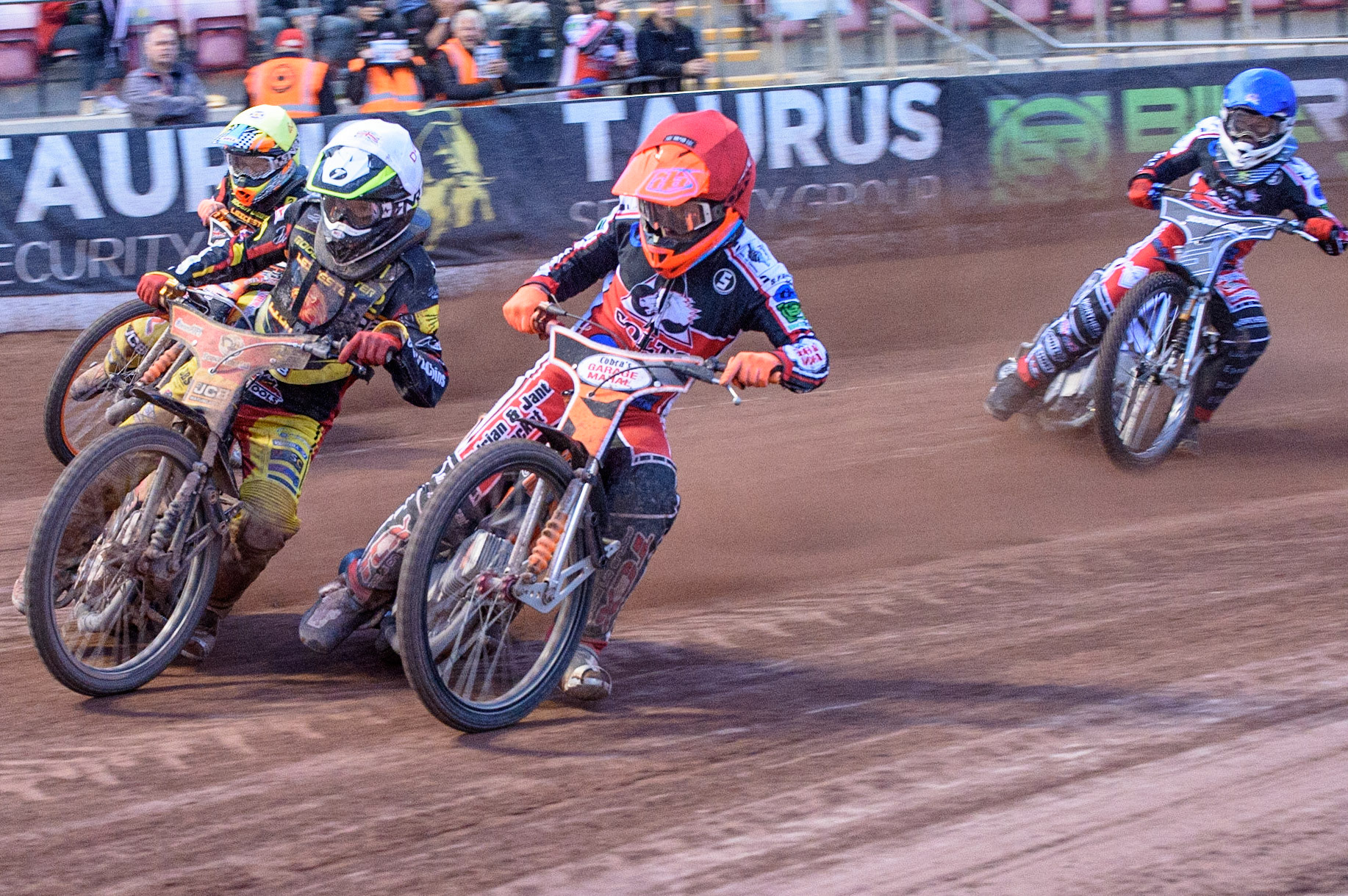 MANCHESTER, UK. JULY 29TH  Connor Coles  (Red) inside Dan Thompson ‘ (White) with Ben Trigger  (Yellow) and Sam McGurk  (Blue) behind  during the National Development League match between Belle Vue Colts and Leicester Lion Cubs at the National Speedway Stadium, Manchester on Thursday 29th July 2021. (Credit: Ian Charles | MI News)