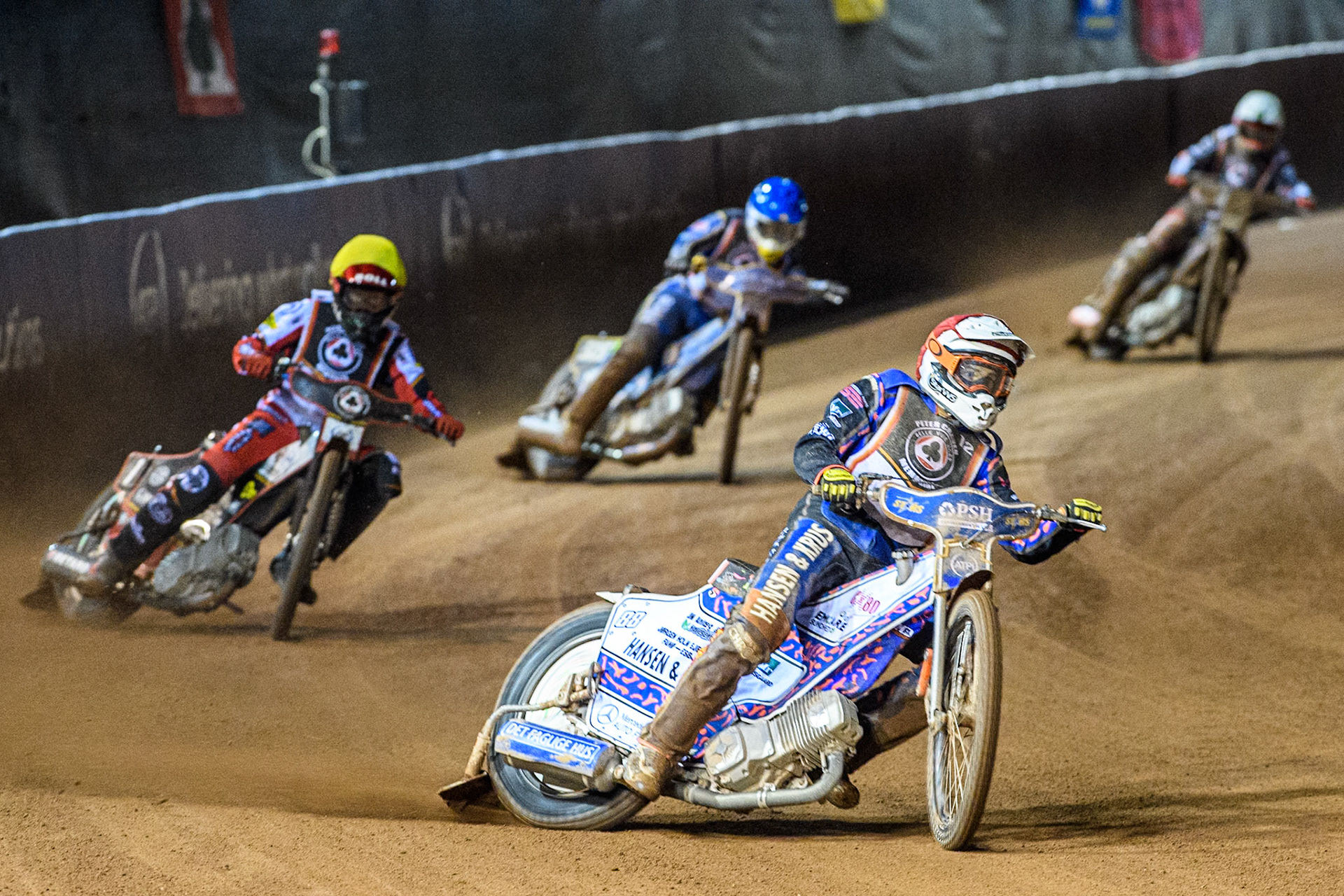 Niels-Kristian Iversen leading Brady Kurtz in Yellow, Robert Lambert in Blue and Freddie Lindgren in White during the Peter Craven Memorial Trophy at the National Speedway Stadium, Manchester on Monday 17th March 2025. (Photo: Ian Charles | MI News)