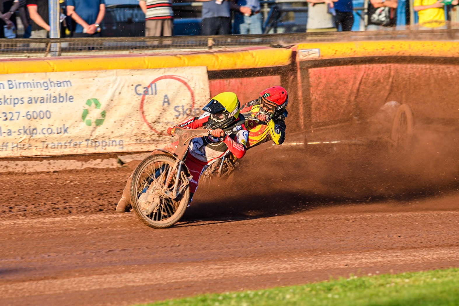 Belle Vue Aces' Brady Kurtz falls again in the rerun of Heat 1 on the first turn behind Belle Vue Aces' Norick Blodorn in Yellow and Birmingham Brummies' Freddie Lindgren in Red during the Rowe Motor Oil Premiership match between Birmingham Brummies and Belle Vue Aces at Perry Bar Stadium, Birmingham on Monday 29th July 2024. (Photo: Ian Charles | MI News)