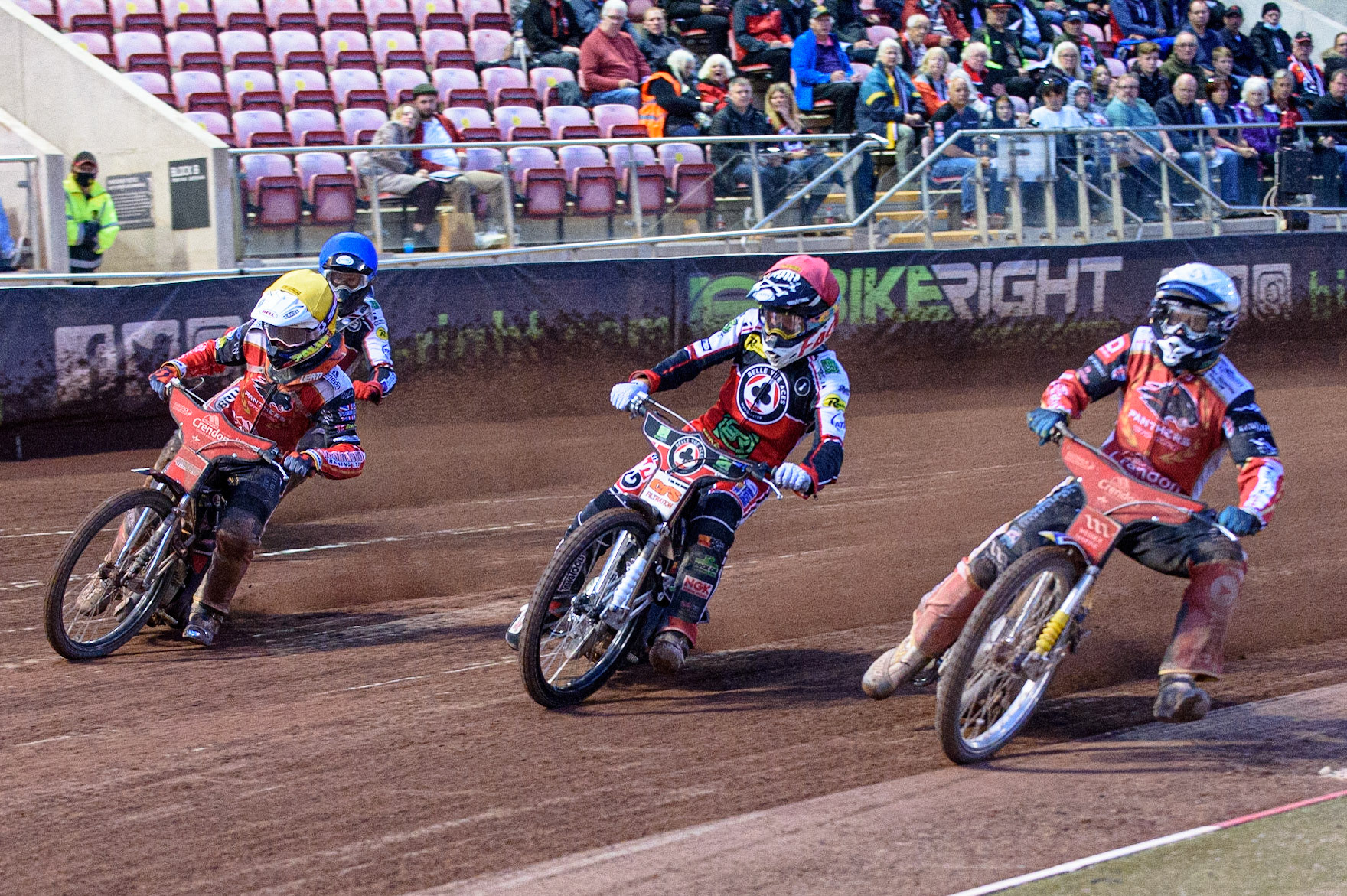 MANCHESTER, UK. AUG 9TH  Bjarne Pedersen  (White) inside Dan Bewley  (Red) Jordan Palin  (Yellow) and Brady Kurtz  (Blue) behind during the SGB Premiership match between Belle Vue Aces and Peterborough at the National Speedway Stadium, Manchester on Monday 9th August 2021. (Credit: Ian Charles | MI News)