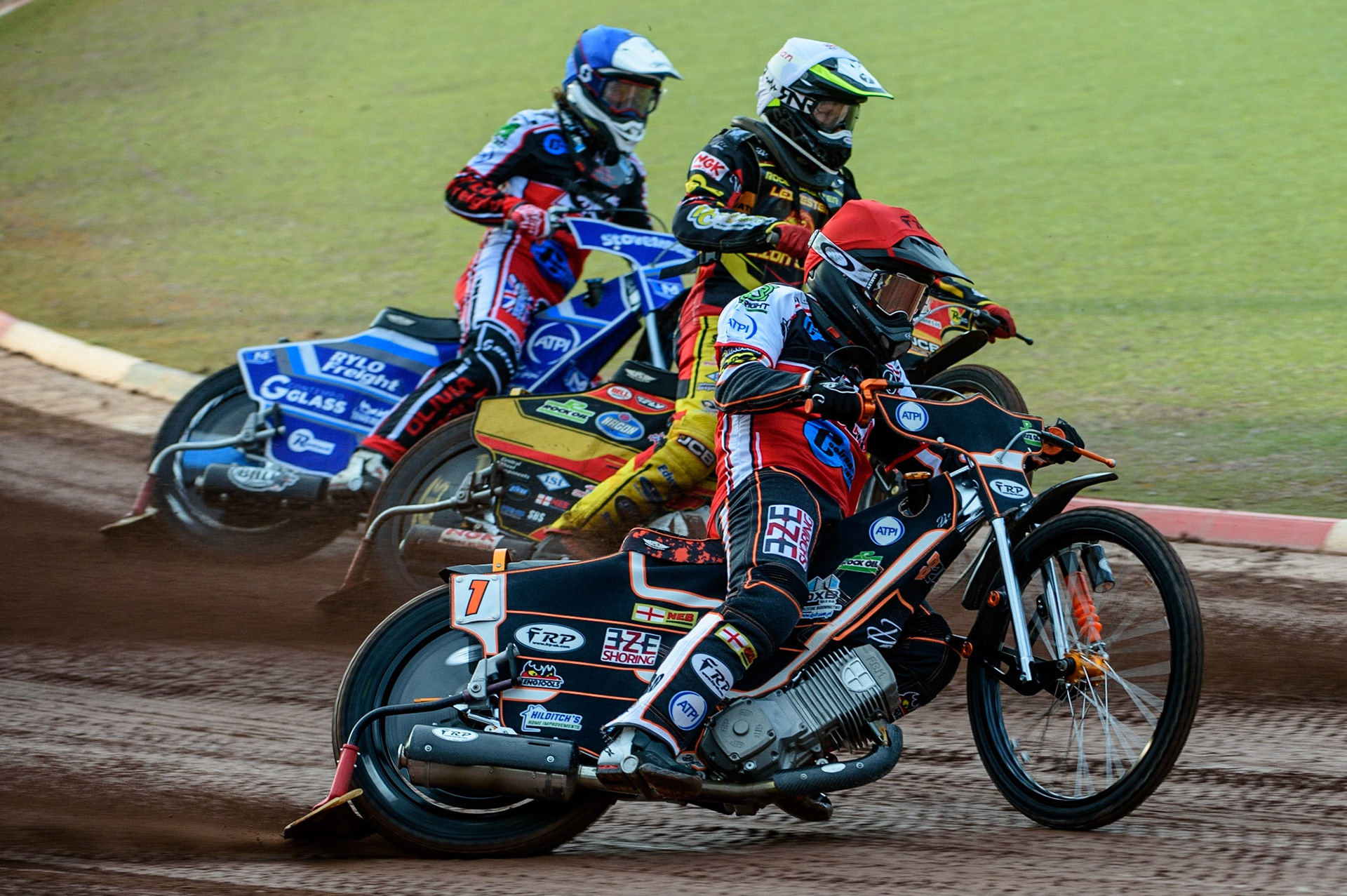MANCHESTER, UK. JULY 29TH  Jack Smith  (Red) outside Dan Thompson  (White) and Harry McGurk  (Blue)  during the National Development League match between Belle Vue Colts and Leicester Lion Cubs at the National Speedway Stadium, Manchester on Thursday 29th July 2021. (Credit: Ian Charles | MI News)