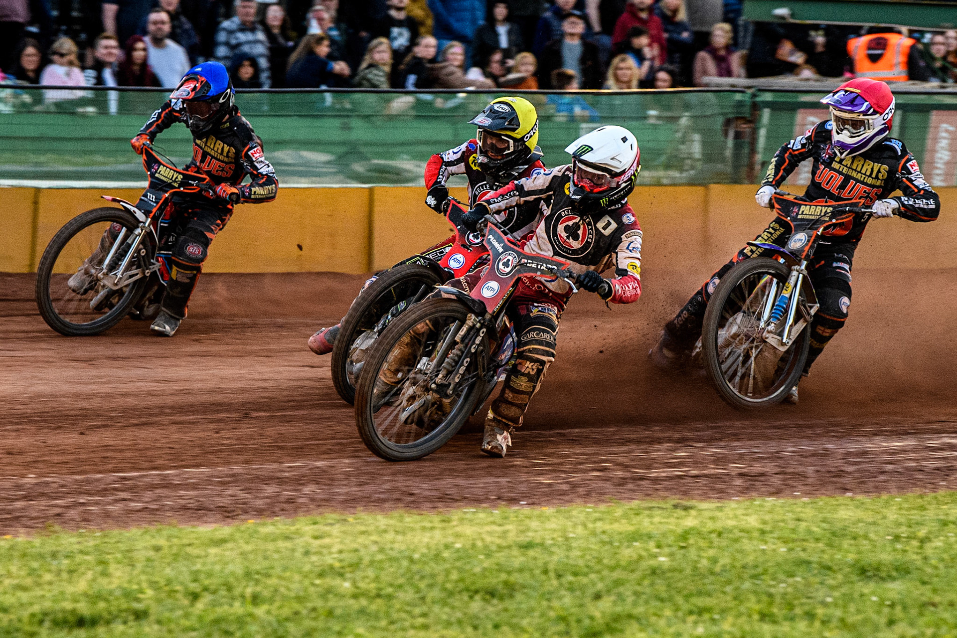 Dan Bewley (White) and Tom Brennan (Yellow) go for maximum points over Rory Schlein (Red) and Zach Cook (Blue) during the Sports Insure Premiership match between Wolverhampton Wolves and Belle Vue Aces at Monmore Green Stadium, Wolverhampton on Monday 29th May 2023. (Photo: Ian Charles | MI News)