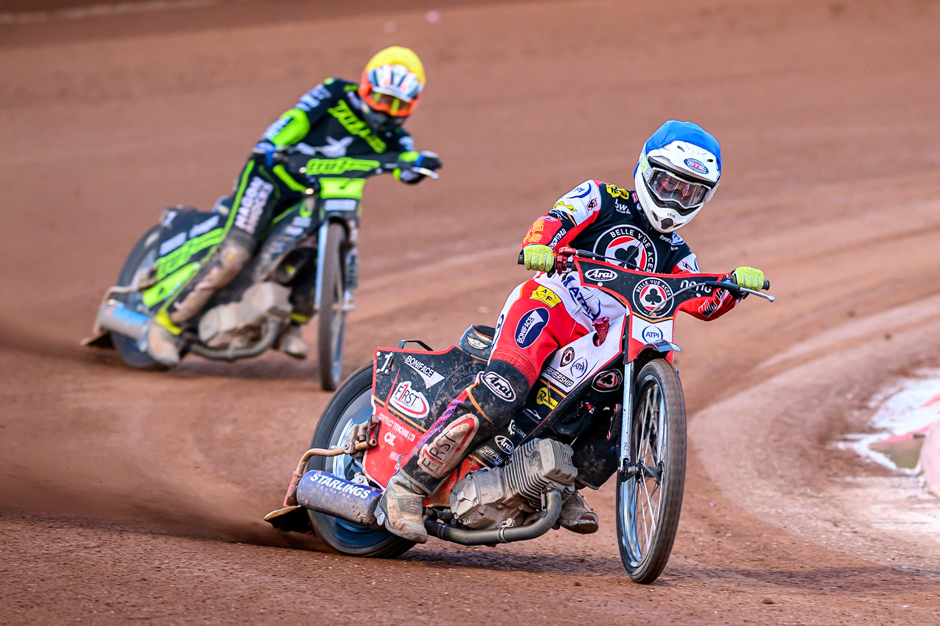 Jake Mulford of Belle Vue Aces  in Blue leading Jason Edwards of Ipswich Witches during the Rowe Motor Oil Premiership match between Belle Vue Aces and Ipswich Witches at the National Speedway Stadium, Manchester on Monday 4th August 2025. (Photo: Ian Charles | MI News)