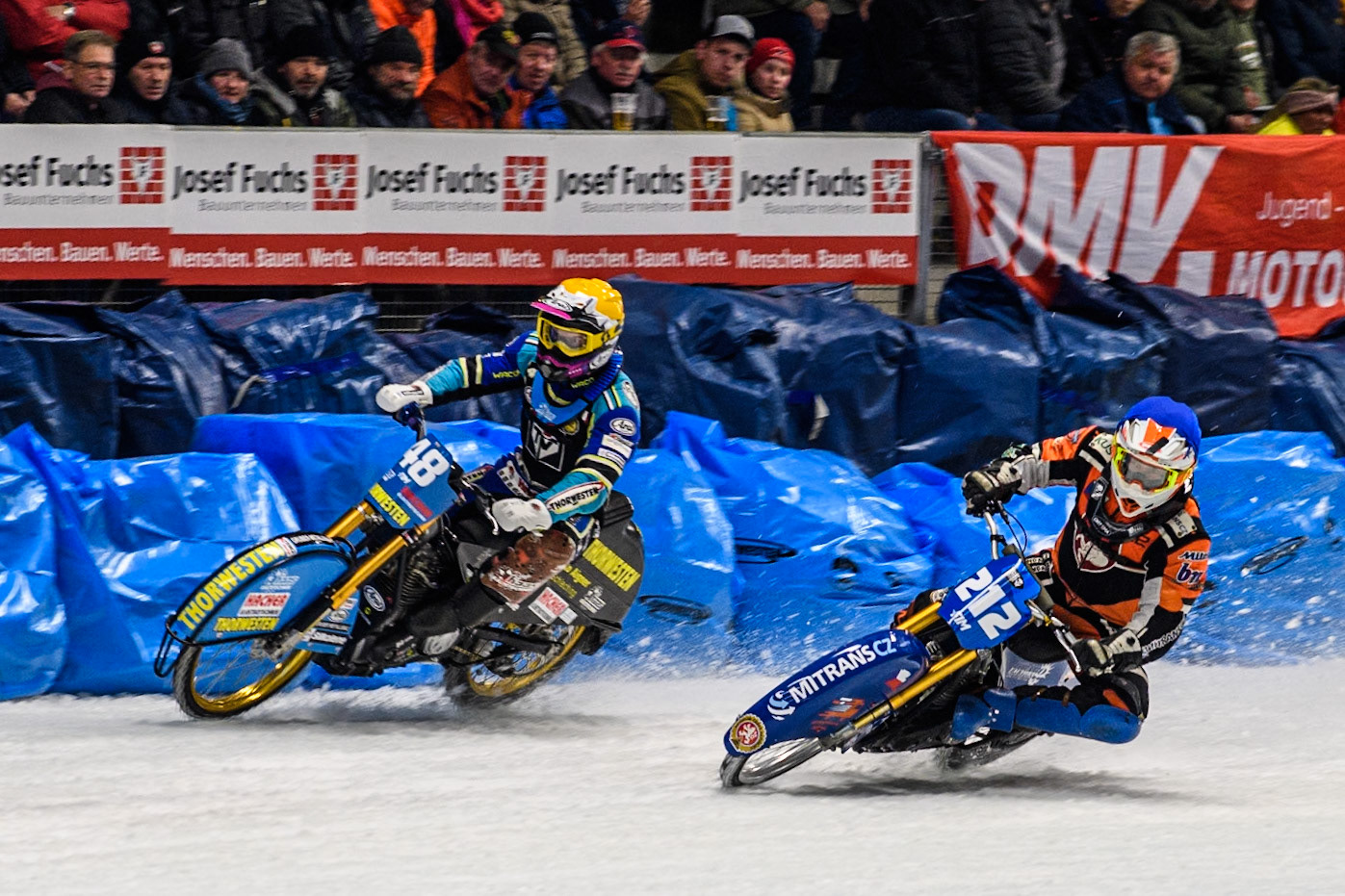 Lukas Hutla (212) of the Czech Republic in Blue rides inside Luca Bauer (48) of Germany in Yellow during the Ice Speedway Gladiators World Championship Final 1 at Max-Aicher-Arena, Inzell on Saturday 15th March 2025. (Photo: Ian Charles | MI News)