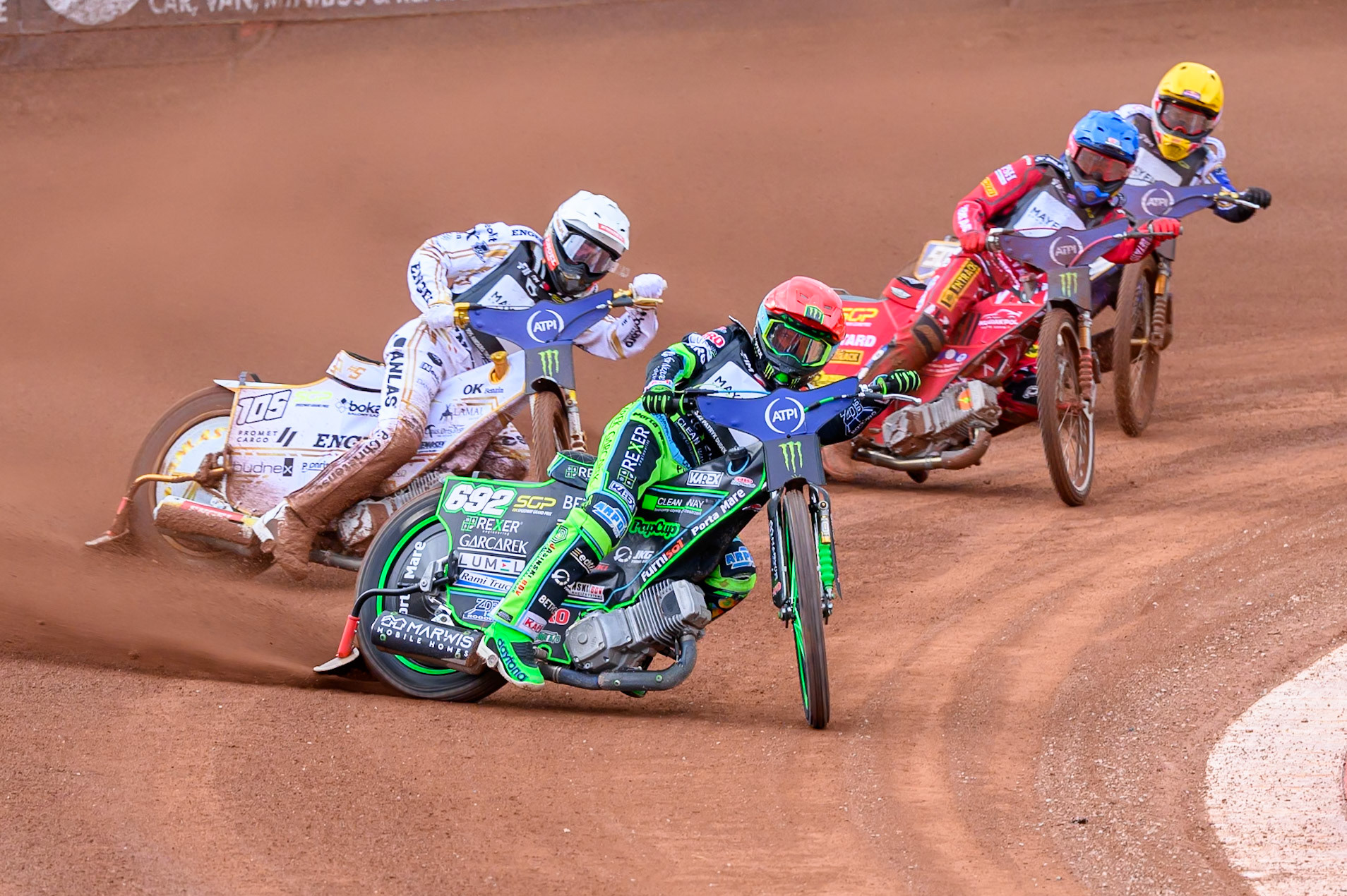 Patryk Dudek (692) of Poland in Red leading Anders Thomsen (105) of Denmark in White Max Fricke (46) of Australia in Blue and Robert Lambert (505) of Great Britain in Yellow during the ATPI  FIM Speedway GP of Manchester at the National Speedway Stadium, Manchester on Friday 5th June 2026. (Photo: Ian Charles | MI News)