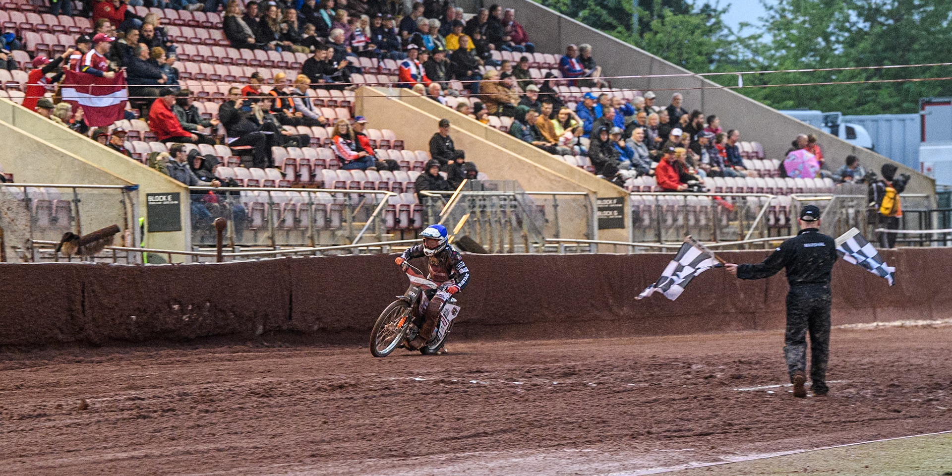 Daniils Kolodinskis of Latvia gets the vital points to give the Latvians third place during the Monster Energy FIM Speedway of Nation Semi Final 2 at the National Speedway Stadium, Manchester on Wednesday 10th July 2024. (Photo: Ian Charles | MI News)
