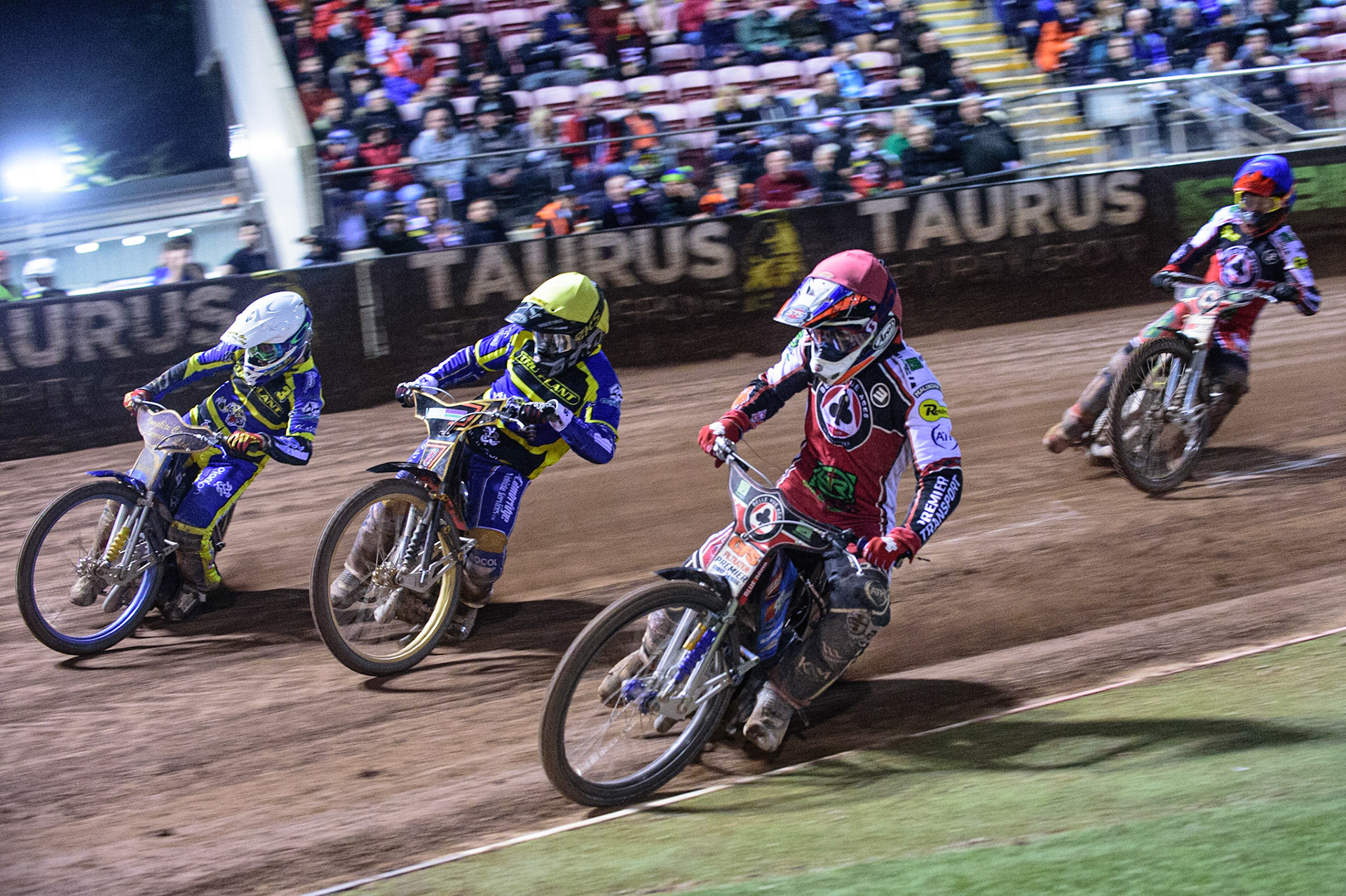 MANCHESTER, UK. OCT 7TH  Steve Worrall  (Red) inside Danyon Hume  (Yellow) and Kyle Howarth (White) with Jye Etheridge   (Blue) behind during the SGB Premiership Play off Semi-Final Second Leg between Belle Vue Aces and Sheffield Tigers at the National Speedway Stadium, Manchester on Thursday 7th October 2021. (Credit: Ian Charles | MI News)