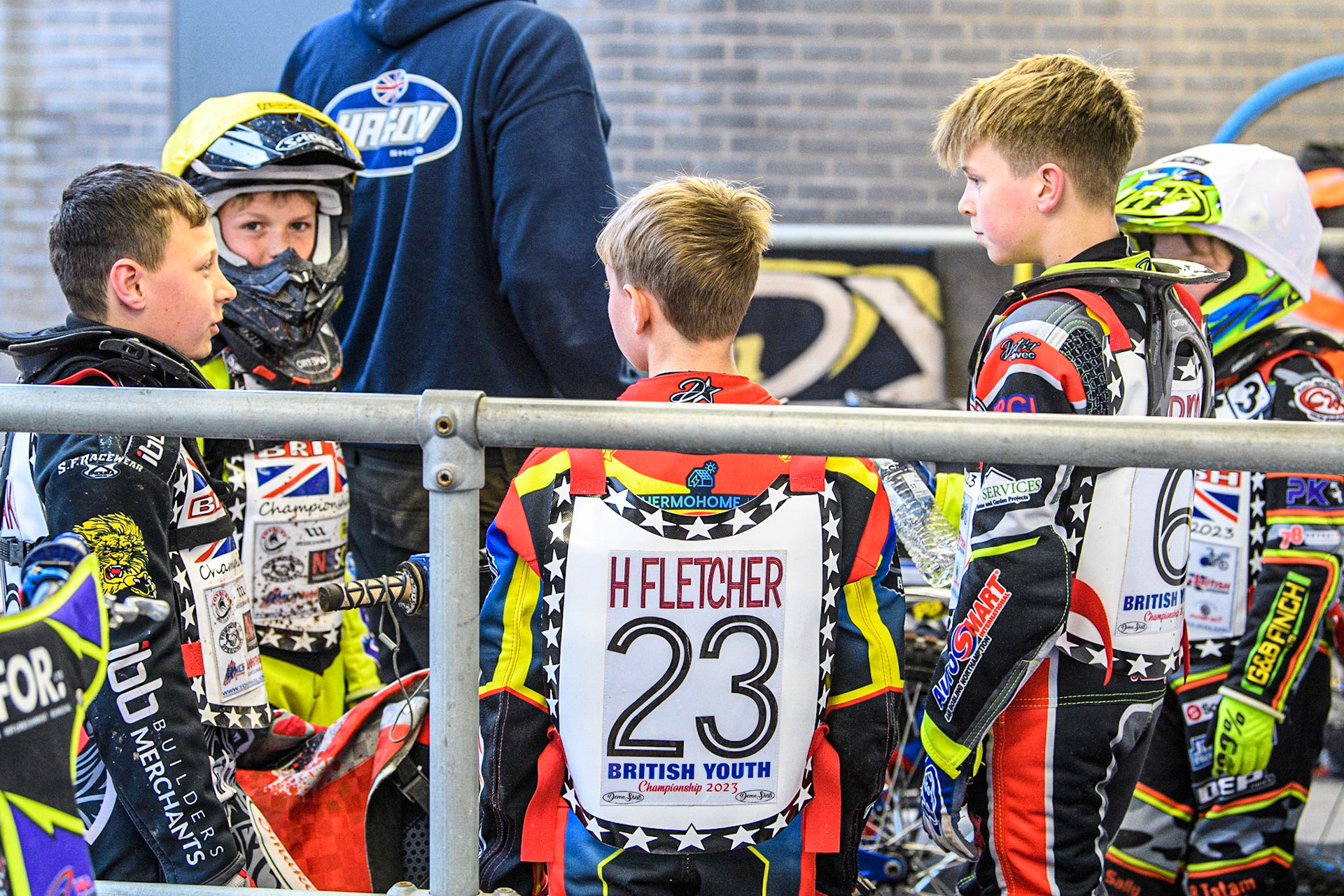 During the break the riders chat with each other during the British Youth Championships at the National Speedway Stadium, Manchester on Friday 12th May 2023. (Photo: Ian Charles | MI News)