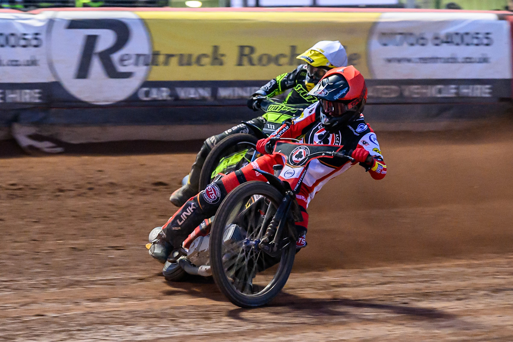 Zach Cook of Belle Vue Aces  in Red leading Adam Ellis of Ipswich Witches  in White during the Rowe Motor Oil Premiership match between Belle Vue Aces and Ipswich Witches at the National Speedway Stadium, Manchester on Monday 4th August 2025. (Photo: Ian Charles | MI News)