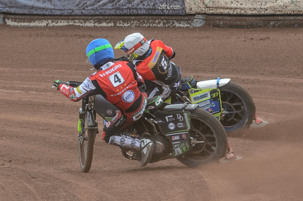 MANCHESTER, UK. MAY 2ND Charles Wright  (Blue) chases Chris Harris  (White)  during the SGB Premiership match between Belle Vue Aces and Peterborough at the National Speedway Stadium, Manchester on Monday 2nd May 2022. (Credit: Ian Charles | MI News)