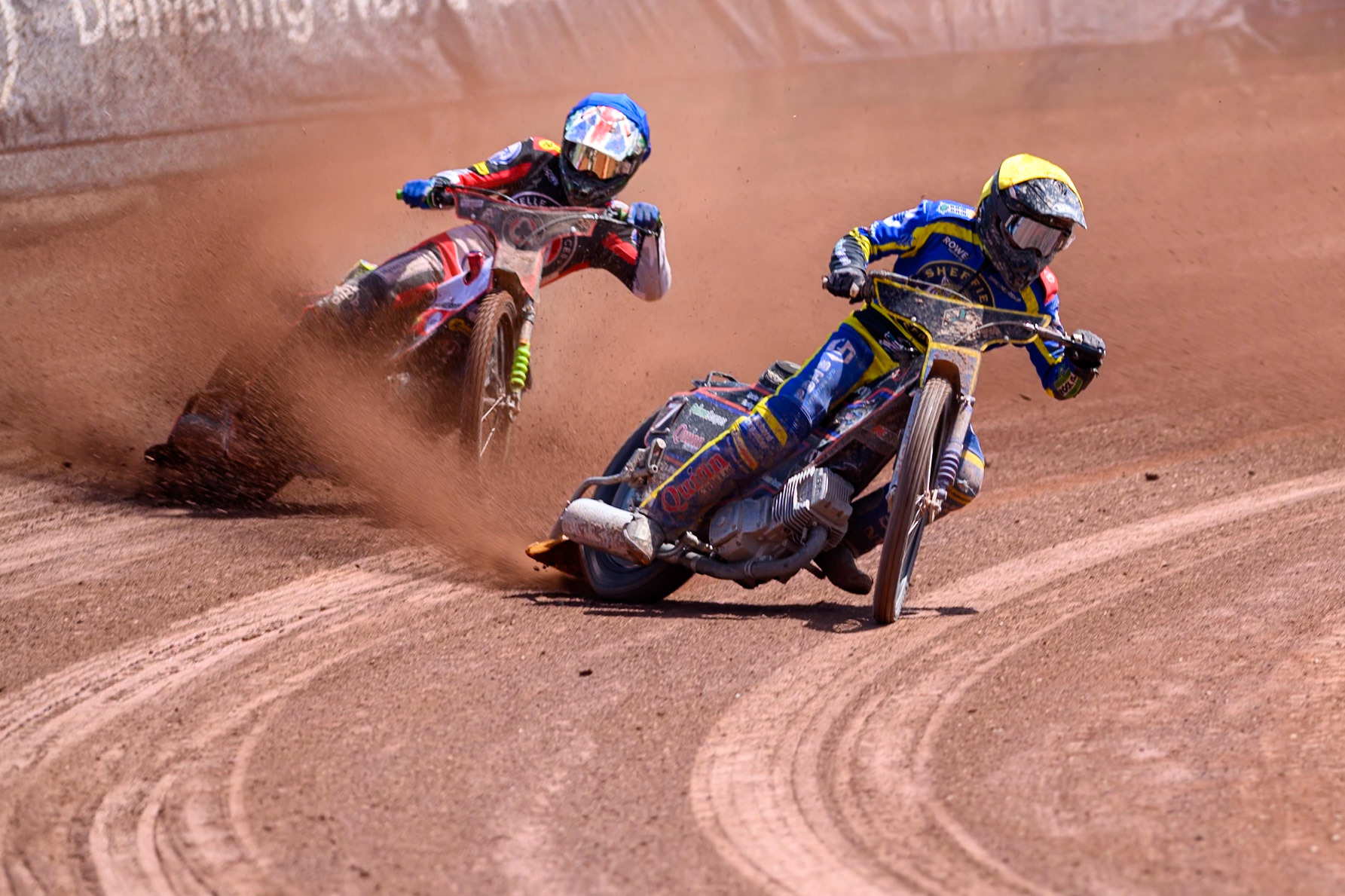 Luke Killeen of Sheffield Tigers  in Yellow leading Will Cairns of Belle Vue Aces in Blue during the Rowe Motor Oil Premiership match between Belle Vue Aces and Sheffield Tigers at the National Speedway Stadium, Manchester on Monday 25th May 2026. (Photo: Ian Charles | MI News)