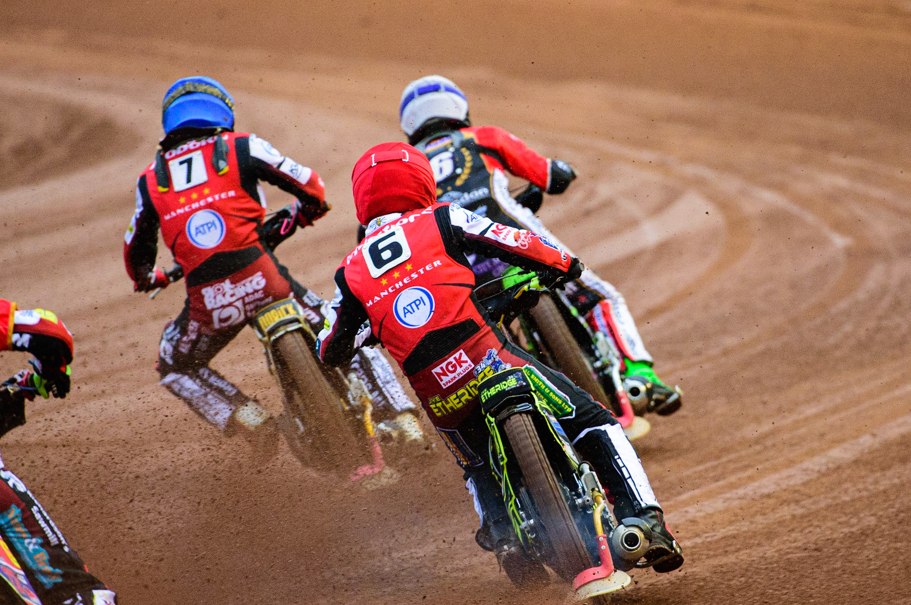 Jye Etheridge  (Red) chases Benjamin Basso  (White) and Norick Blödorn  (Blue) during the SGB Premiership match between Belle Vue Aces and Peterborough at the National Speedway Stadium, Manchester on Monday 25th July 2022. (Credit: Ian Charles | MI News