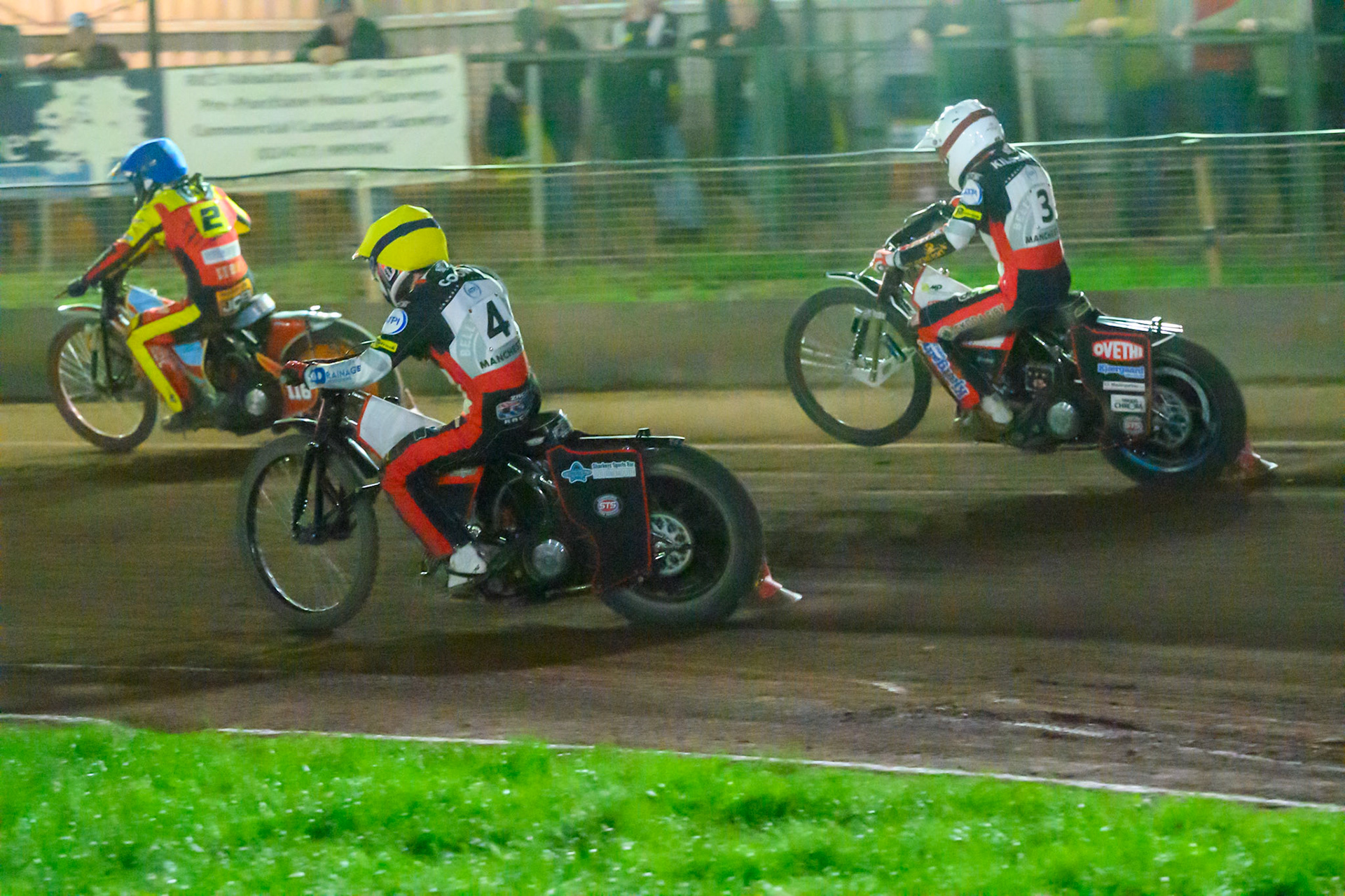 Zach Cook of Belle Vue Aces  in Yellow  and Peter Kildemand of Belle Vue Aces  in White chase Drew Kemp of Leicester Lions  in Blue during the Rowe Motor Oil Premiership match between Leicester Lions and Belle Vue Aces at the Hydroscan Arena, Leicester on Monday 7th September 2026. (Photo: Ian Charles | MI News)