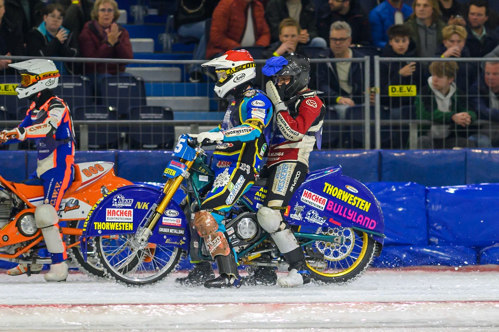 Luca Bauer (85) of Italy/Germany  gives Ove Ledström (97) of Sweden  a lift back to the pits after his Heat 2 fall during the FIM Ice Speedway Gladiators World Championship Final 3 at Ice Rink Thialf, Heerenveen on Saturday 11th April 2026. (Photo: Ian Charles | MI News)