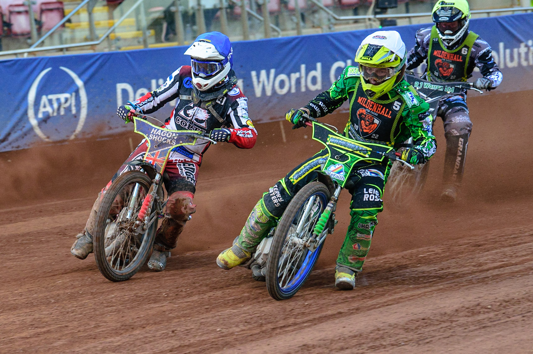 Sam Bebee  (White) inside Jake Mulford  (Blue) with Josh Warren  behind during the National Development League match between Belle Vue Colts and Mildenhall Fens Tigers at the National Speedway Stadium, Manchester on Friday 15th July 2022. (Credit: Ian Charles | MI News)