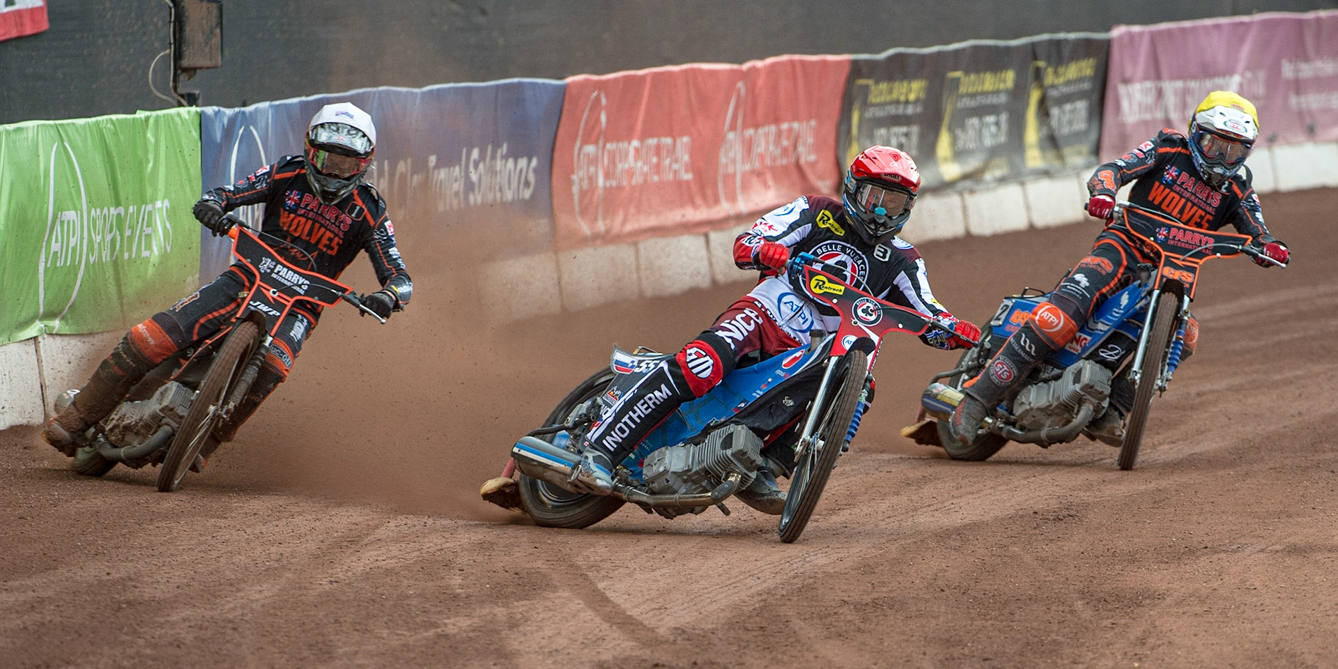 MANCHESTER, UK. JUN 13TH Matej Zagar (Red) leads Sam Masters  (White) and Steve Worrall  (Yellow) during the SGB Premiership match between Belle Vue Aces and Wolverhampton  Wolves at the National Speedway Stadium, Manchester on Monday 13th June 2022. (Credit: Ian Charles | MI News)