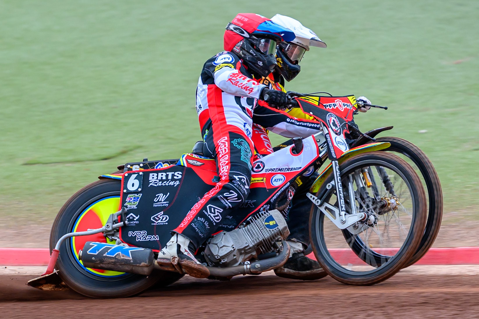 Tate Zischke of Belle Vue Aces in Red battles with Kyle Howarth of Leicester Lions in White during the Rowe Motor Oil Premiership match between Belle Vue Aces and Leicester Lions at the National Speedway Stadium, Manchester on Monday 15th June 2026. (Photo: Ian Charles | MI News)
