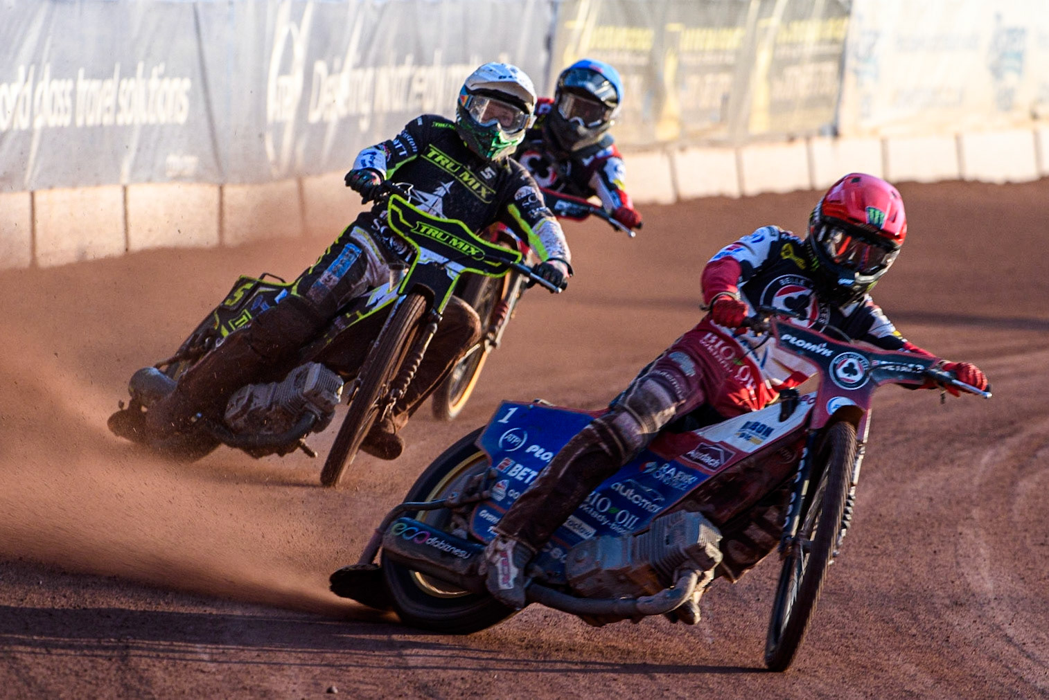 Dan Bewley (Red) leads Jason Doyle (White) and Norick Blodorn (Blue) during the Sports Insure Premiership match between Belle Vue Aces and Ipswich Witches at the National Speedway Stadium, Manchester on Monday 17th July 2023. (Photo: Ian Charles | MI News)