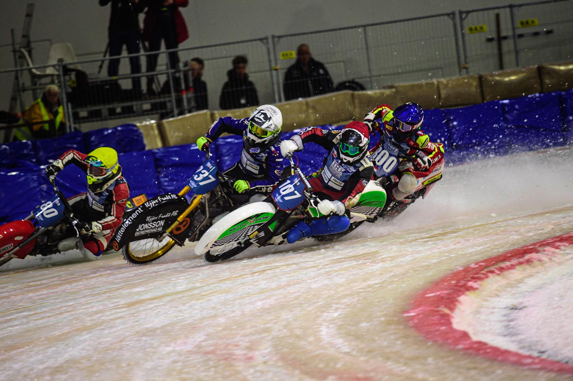 HEERENVEEN, NL. Jasper Iwema (800) (Blue) gets into some difficulty behind Andrej Divis (107) (Red) Jimmy Hörrnell (237)  (White) and Jiri Wildt (80) (Yellow)  during the FIM Ice Speedway Gladiators World Championship Final 4 at Ice Rink Thialf, Heerenveen on Sunday  3 April 2022. (Credit: Ian Charles | MI News)