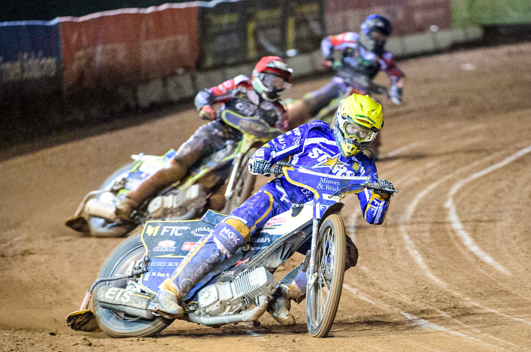 Fredrik Jacobsen (Yellow) leads Chris Harris (Red) and Benjamin Basso (Blue) during the Grant Henderson Pairs at the National Speedway Stadium, Manchester on Thursday 27th October 2022. (Credit: Ian Charles | MI NEWS)