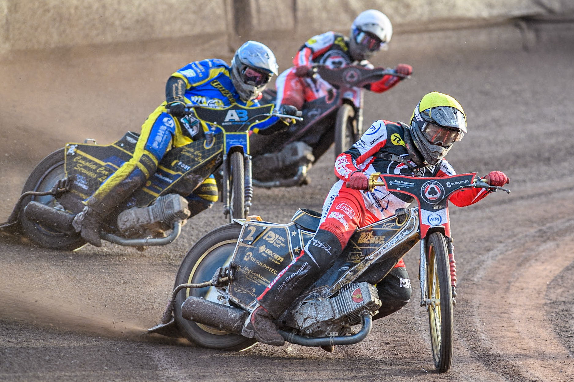 Belle Vue Aces' Norick Blodorn  in Yellow leading Sheffield Tigers' Kyle Howarth  in Blue and Belle Vue Aces' Brady Kurtz  in White during the Premiership KO Cup Quarter Final, 2nd Leg match between Sheffield Tigers and Belle Vue Aces at Owlerton Stadium, Sheffield on Thursday 9th May 2024. (Photo: Ian Charles | MI News)