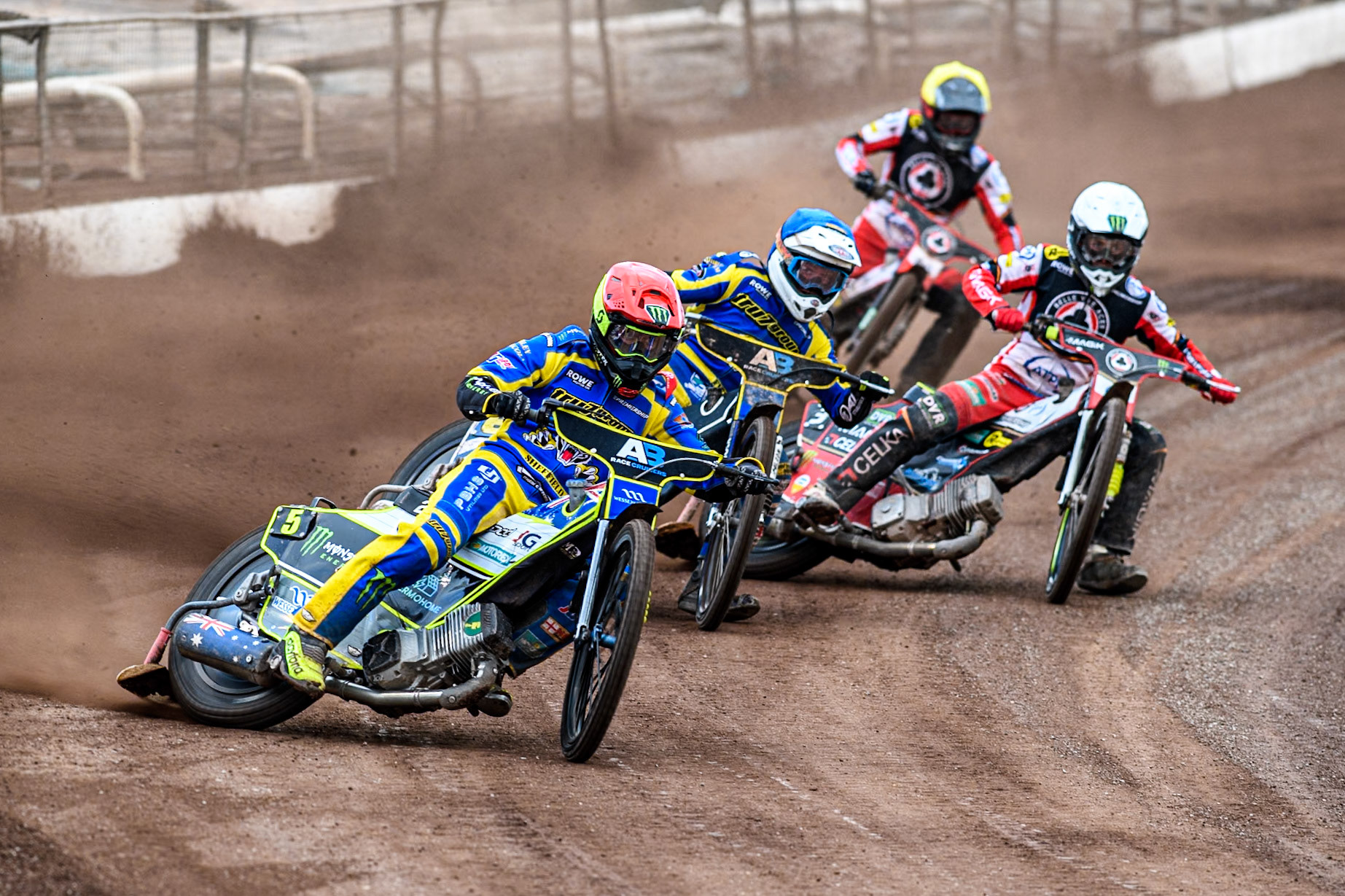 Chris Holder of Sheffield Tigers in Red and Lewis Kerr of Sheffield Tigers in Blue leading Jaimon Lidsey of Belle Vue Aces in White and Zach Cook of Belle Vue Aces in Yellow during the Rowe Motor Oil Premiership match between Sheffield Tigers and Belle Vue Aces at Owlerton Stadium, Sheffield on Monday 5th May 2025. (Photo: Ian Charles | MI News)