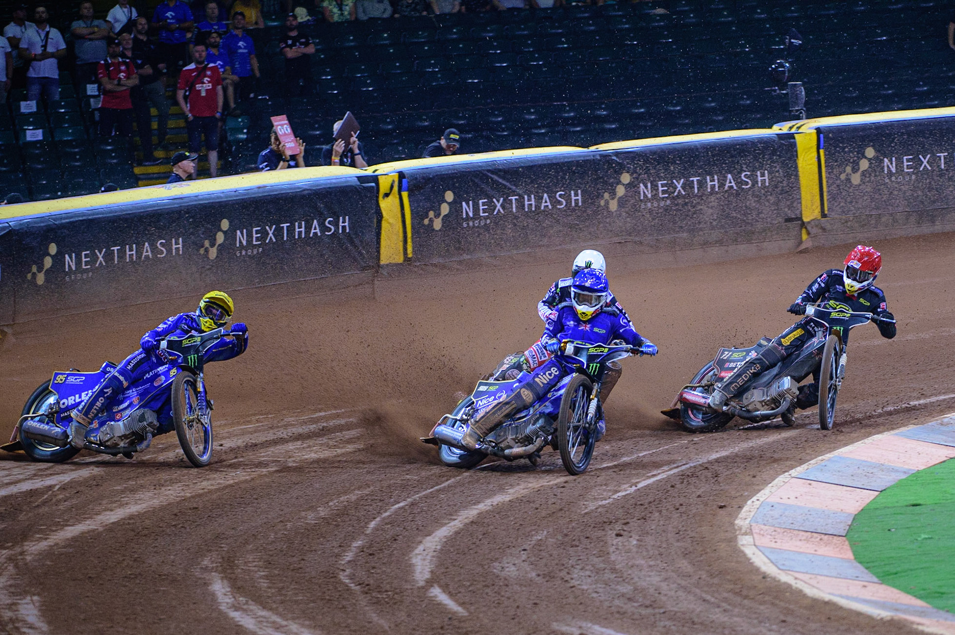 Robert Lambert (505) (Blue) leads Bartosz Zmarzlik (95) (Yellow), Maciej Janowski (71) (Red) and Fredrik Lindgren (66) (White) during the FIM  Speedway Grand Prix of Great Britain at the Principality Stadium, Cardiff on Saturday 13th August 2022. (Credit: Ian Charles | MI News