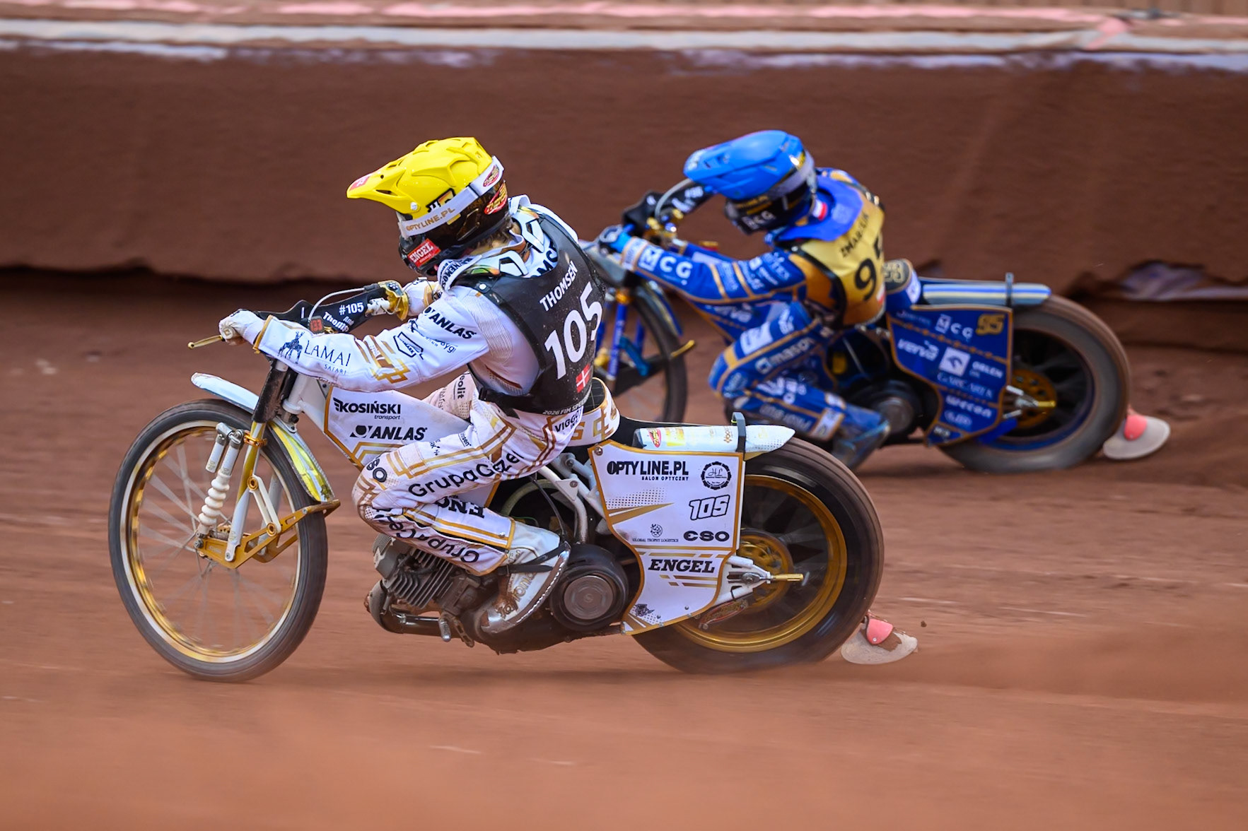 Anders Thomsen (105) of Denmark in Yellow rides inside Bartosz Zmarzlik (95) of Poland in Blue during the ATPI  FIM Speedway GP of Manchester at the National Speedway Stadium, Manchester on Saturday 6th June 2026. (Photo: Ian Charles | MI News)