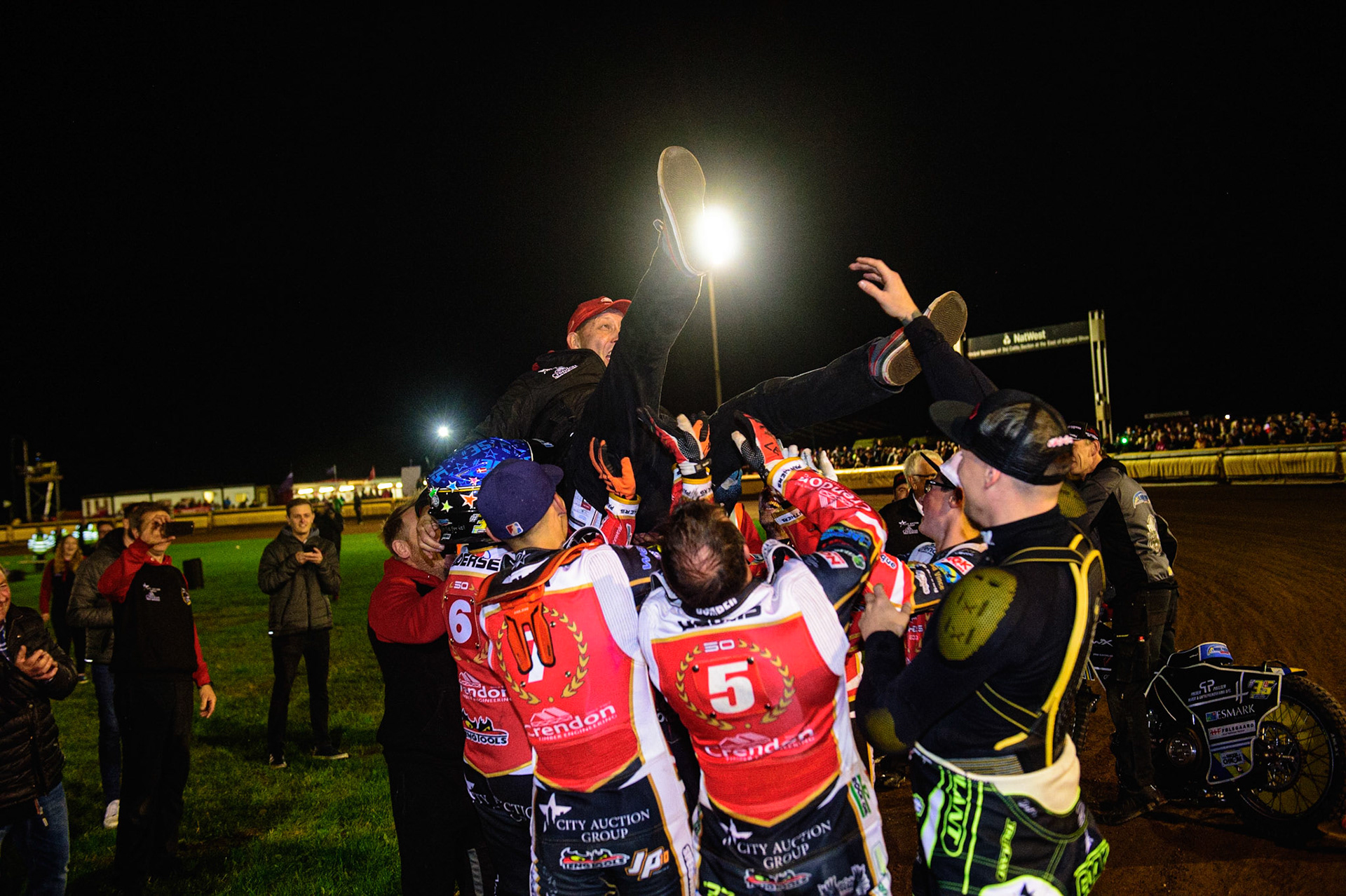 PETERBOROUGH, UK. OCT 14TH The Panthers give team manager Rob Lyon  the bumps during the SGB Premiership Grand Final 2nd leg between Peterborough and Belle Vue Aces at East of England Showground, Peterborough on Thursday 14th October 2021. (Credit: Ian Charles | MI News)