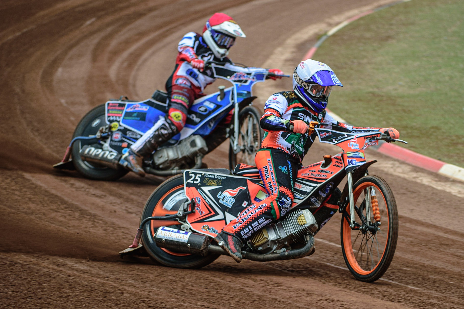 MANCHESTER, UK. APR 15TH   Ben Trigger  (White) leads Archie Freeman  (Red) during the National Development League match between Belle Vue Colts and Plymouth Centurions at the National Speedway Stadium, Manchester on Friday 15th April 2022. (Credit: Ian Charles | MI News)