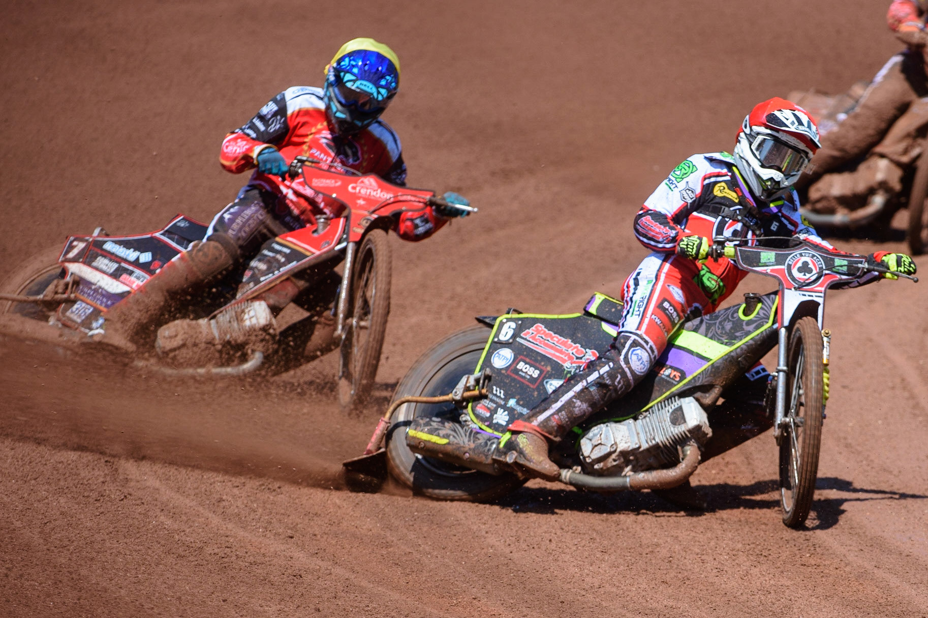 MANCHESTER, UK. MAY 31ST  Tom Brennan (Red) leads Ulrich Ostergaard  (Yellow) during the SGB Premiership match between Belle Vue Aces and Peterborough at the National Speedway Stadium, Manchester on Monday 31st May 2021. (Credit: Ian Charles | MI News)
