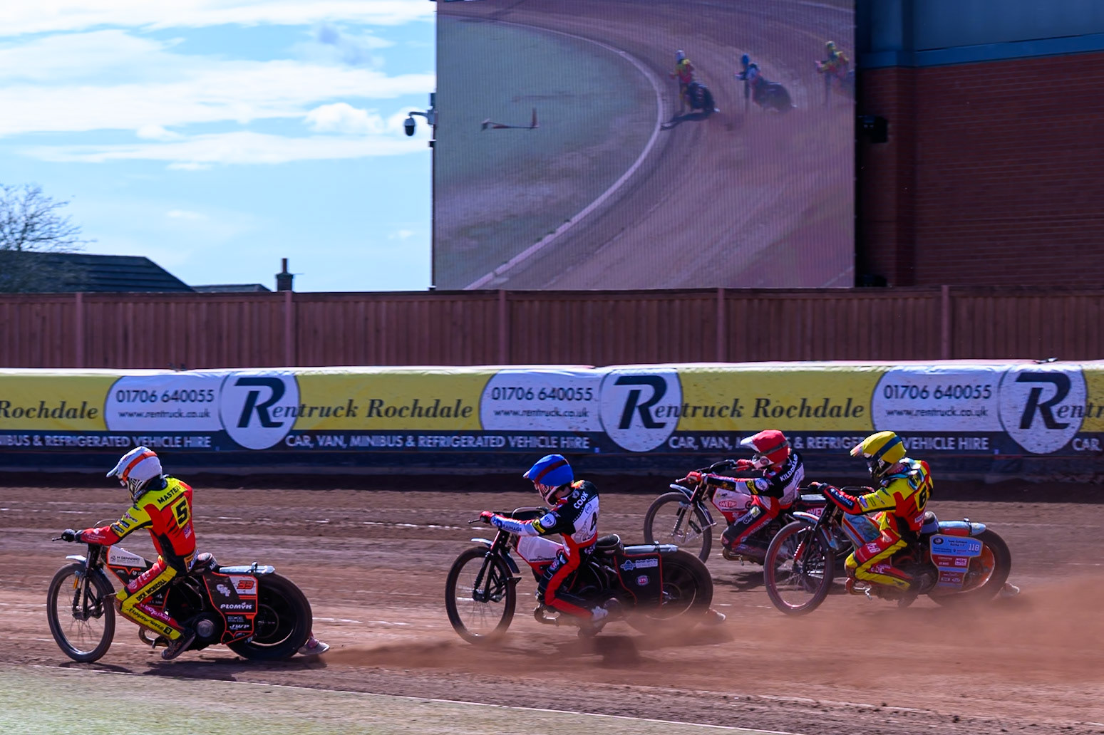Sam Masters of Leicester Lions  in White leading Peter Kildemand of Belle Vue Aces  in Red, Drew Kemp of Leicester Lions  in Yellow and Zach Cook of Belle Vue Aces  in Blue during the Knockout Cup Northern Section match between Belle Vue Aces and Leicester Lions at the National Speedway Stadium, Manchester on Monday 6th April 2026. (Photo: Ian Charles | MI News)
