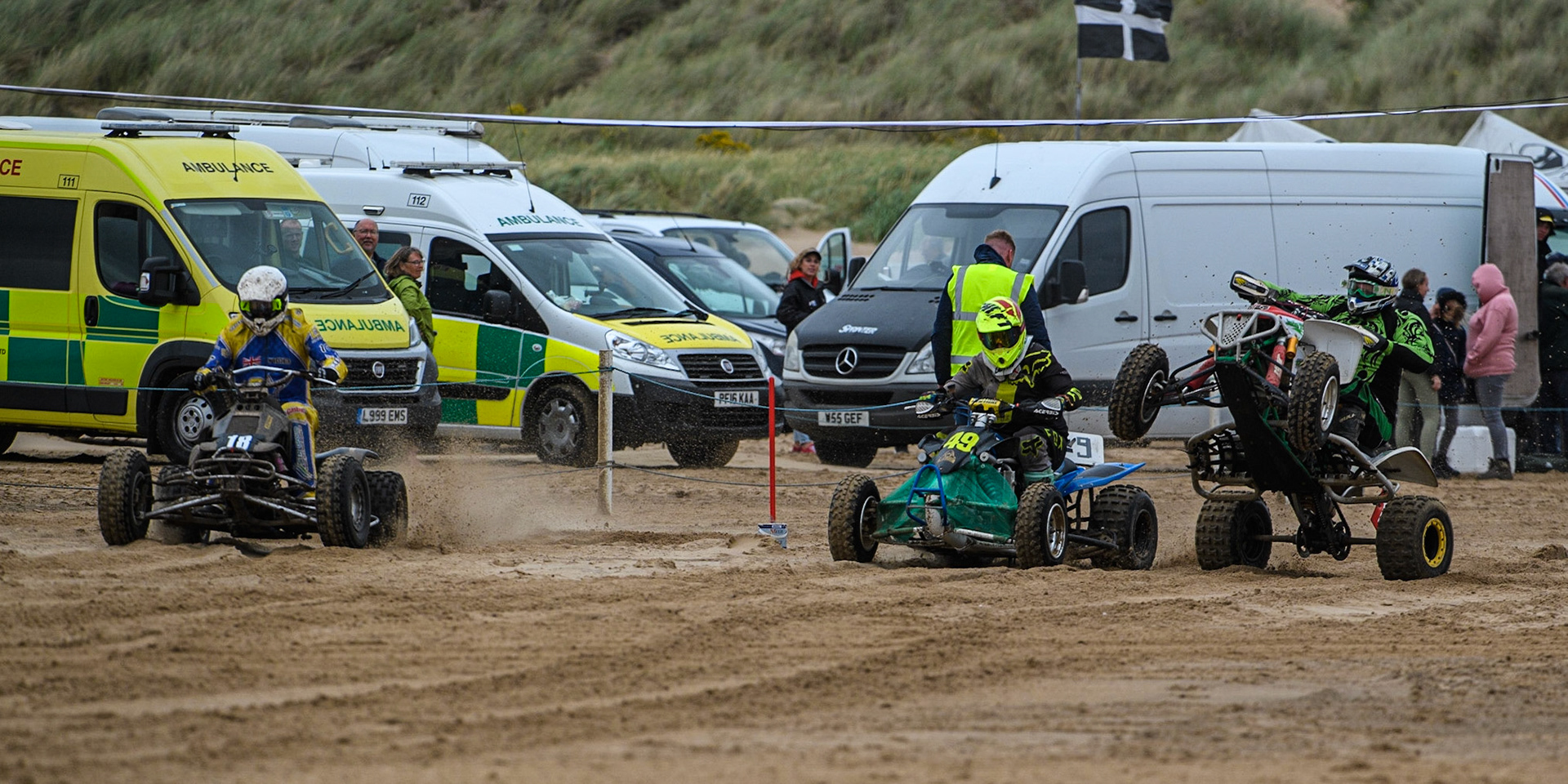 (l - r) Rob Heath (18) and Liam Whetton (49) leave the start as Duncan Elliot (10) gets some grip as they leave the start during the Fylde ACU British Sand Racing Masters Championship at  St Annes on Sea, Lancashire on Sunday 30th July 2023. (Photo: Ian Charles | MI News)