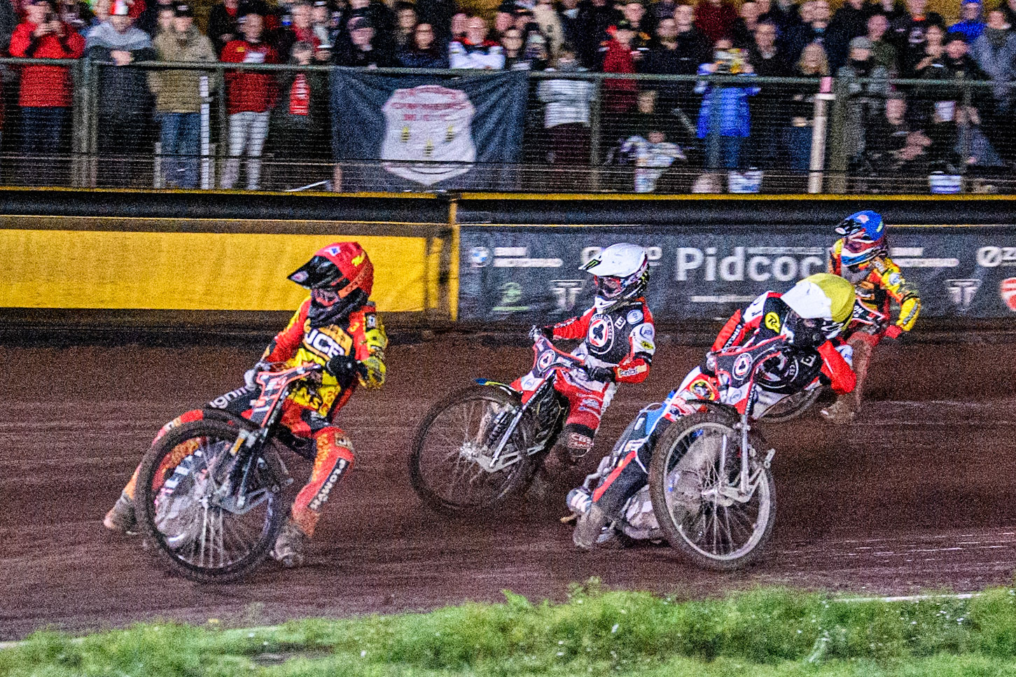 Leicester Lions' Sam Masters in Red leading Belle Vue Aces' Jaimon Lidsey in White, Belle Vue Aces' Antti Vuolas in Yellow and Leicester Lions' Sam Hagon in Blue during the Rowe Motor Oil Premiership Grand Final 2nd Leg between Leicester Lions and Belle Vue Aces at the Pidcock Motorcycles Arena, Leicester on Thursday 26th September 2024. (Photo: Ian Charles | MI News)