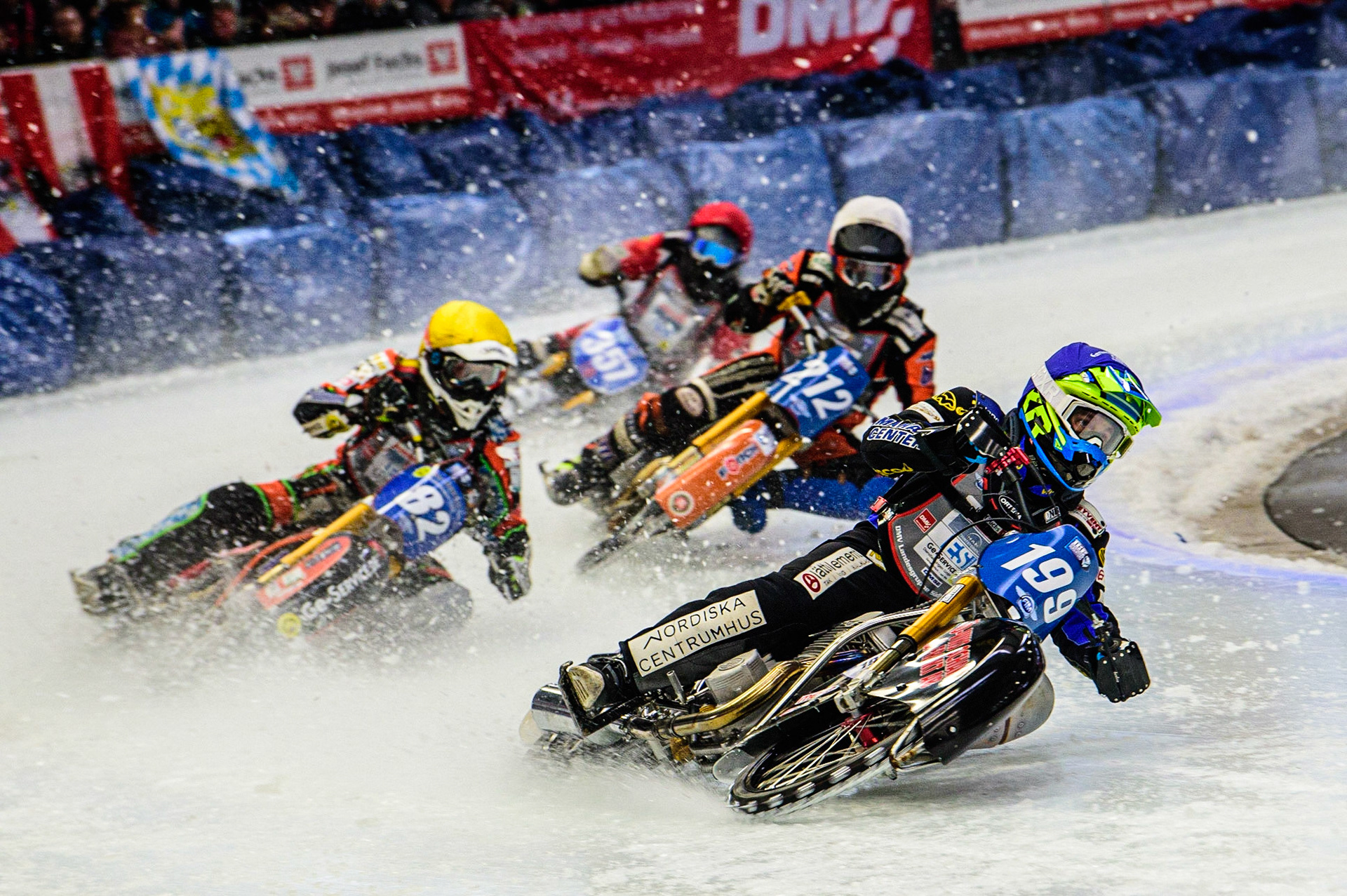Martin Haarahiltunen (199) (Blue) leads Markus Jell (82) (Yellow) Lukas Hutla (212) (White) and Jo Saetre (357) (Red) during the Ice Speedway Gladiators World Championship Final 2 at Max-Aicher-Arena, Inzell, Germany on Sunday 19th March 2023. (Photo: Ian Charles | MI News)