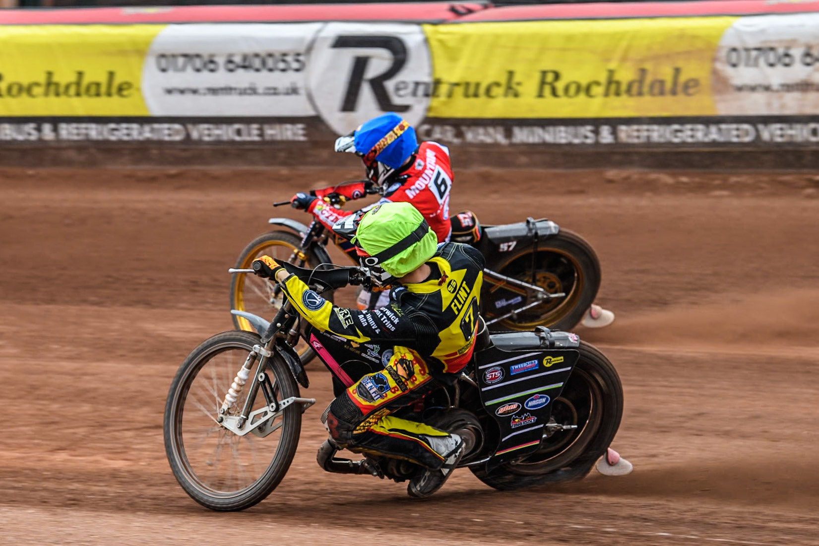 Birmingham Brummies' Leon Flint  in Yellow rides inside Belle Vue Aces' Connor Mountain  in Blue during the Rowe Motor Oil Premiership match between Belle Vue Aces and Birmingham Brummies at the National Speedway Stadium, Manchester on Monday 6th May 2024. (Photo: Ian Charles | MI News)