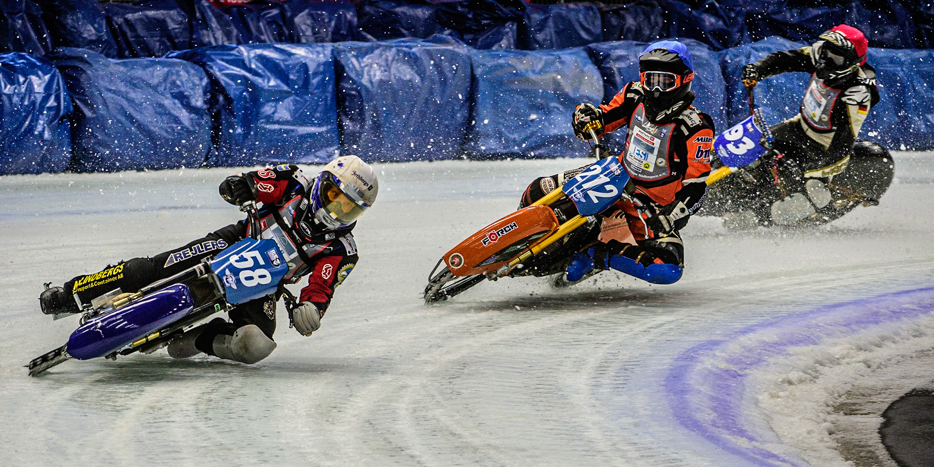 Stefan Svensson (58) (White) leads Lukas Hutla (212) (Blue) who appears to have hit a rut, with Franz Mayerbüchler (93) (Red) behind during the Ice Speedway Gladiators World Championship Final 1 at Max-Aicher-Arena, Inzell, Germany on Saturday 18th March 2023. (Photo: Ian Charles | MI News)