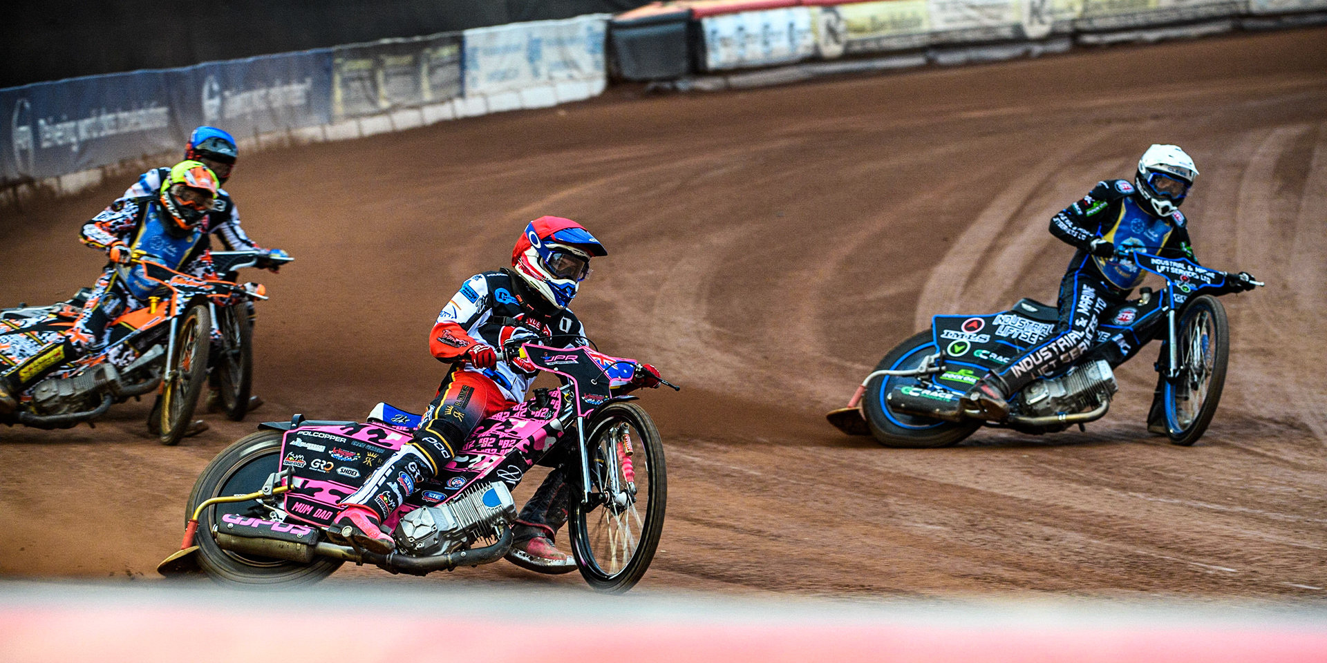 James Pearson (Red) outside Max Clegg (White) with Mickie Simpson (Yellow) and Matt Marson (Blue) behind during the National Development League match between Belle Vue Colts and Edinburgh Monarchs Academy at the National Speedway Stadium, Manchester on Friday 21st July 2023. (Photo: Ian Charles | MI News)