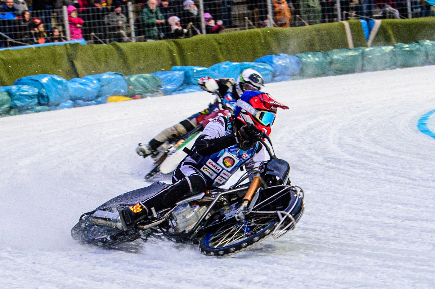 Atte Suolami (Blue) leads Andrej Divis (White) during the German Individual Ice Speedway Championship at Horst-Dohm-Eisstadion, Berlin on Friday 3rd March 2023. (Photo: Ian Charles | MI News)