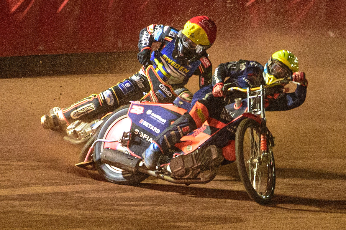 Andzejs Lebedevs (Latvia) (Yellow) passes Kim Nilsson (Sweden) (Red) during the FIM Speedway Grand Prix Challenge at the Peugeot Ashfield Stadium, Glasgow on Saturday 20th August 2022. (Credit: Ian Charles | MI News)