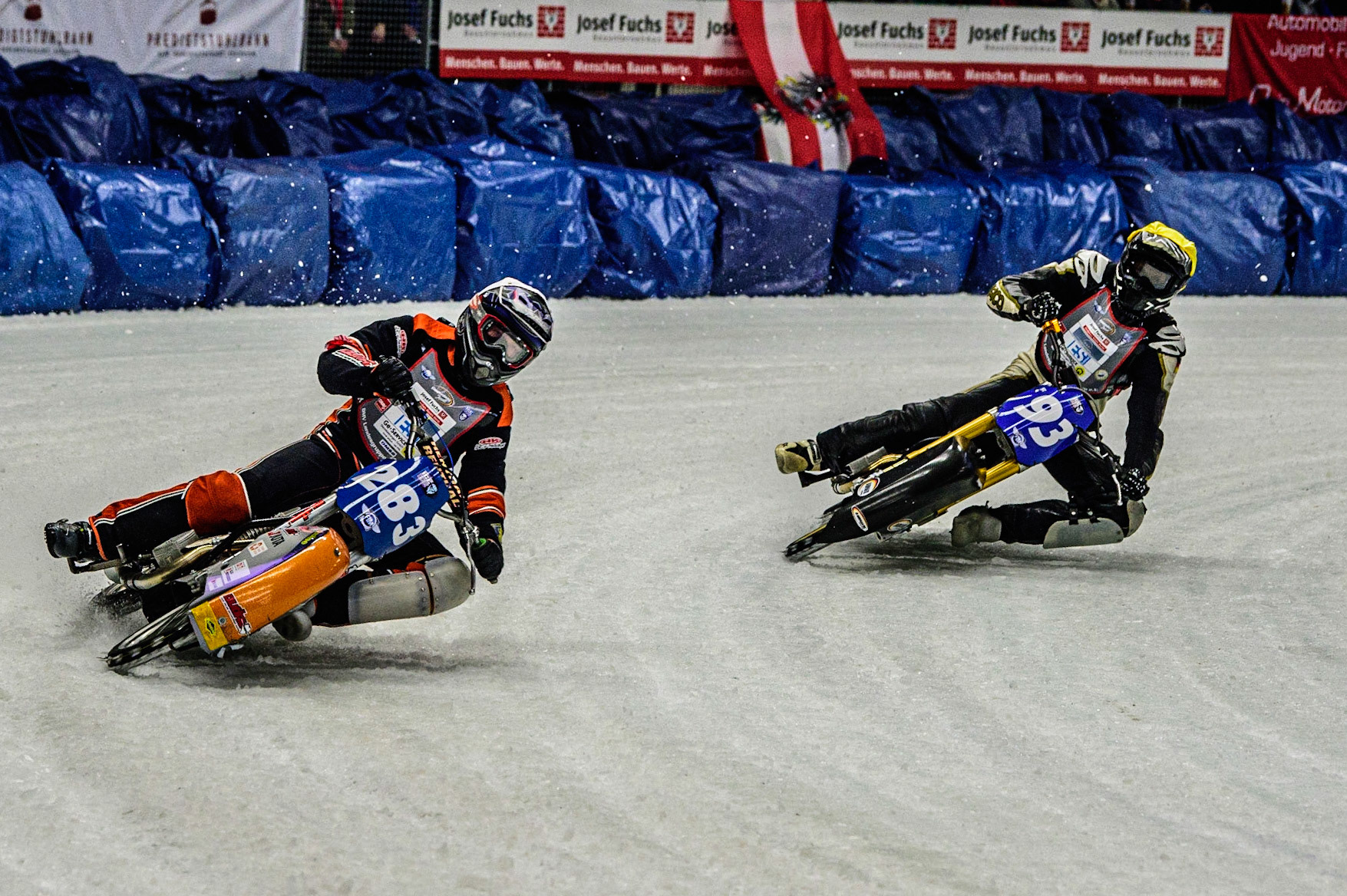 Sebastian Reitsma (283) (White) leads Franz Mayerbüchler (93) (Yellow) during the Ice Speedway Gladiators World Championship Final 1 at Max-Aicher-Arena, Inzell, Germany on Saturday 18th March 2023. (Photo: Ian Charles | MI News)