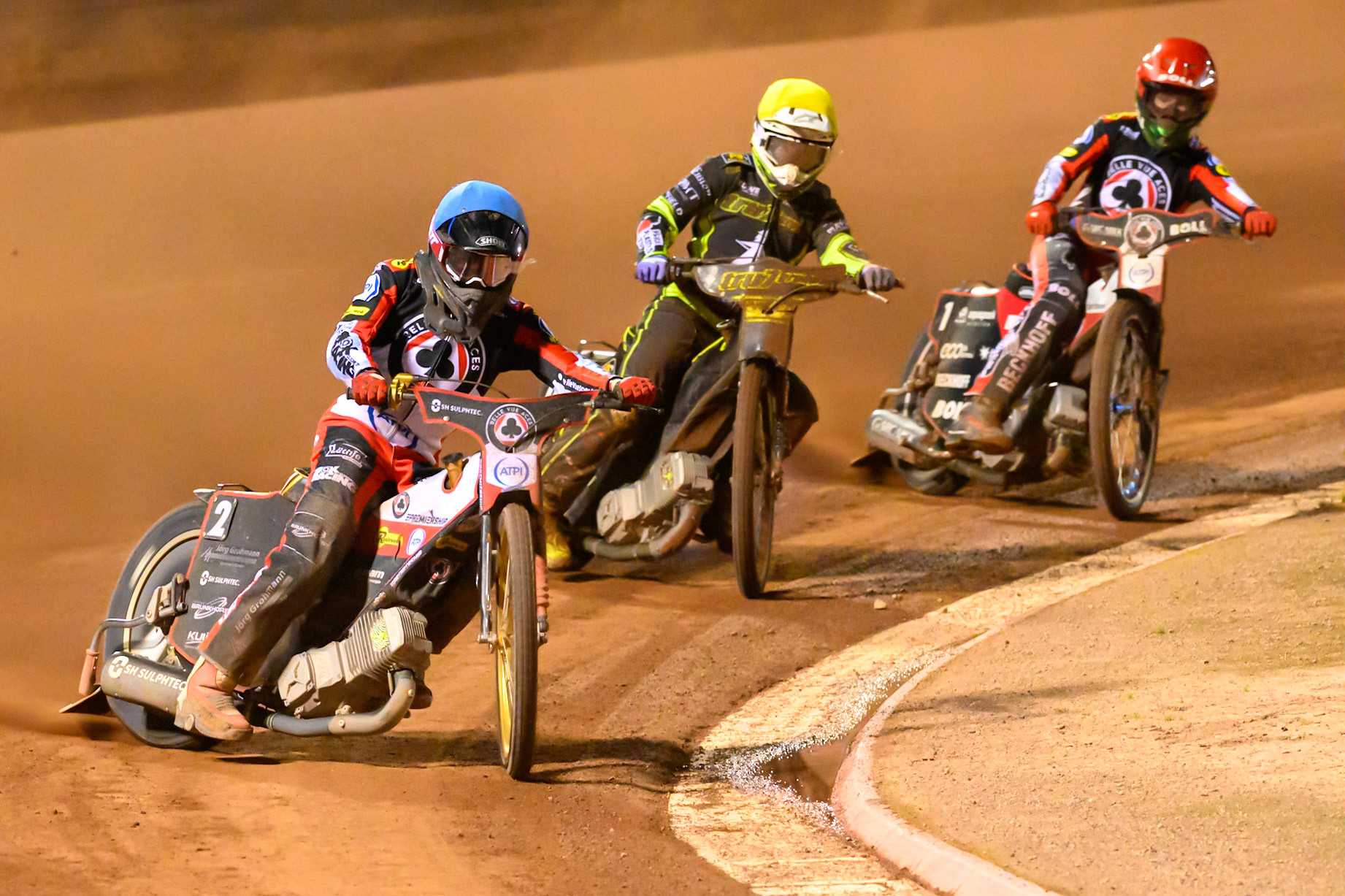 Norick Blödorn of Belle Vue Aces in Blue leading Tom Brennan of Ipswich Witches in Yellow  and Brady Kurtz of Belle Vue Aces in Red during the Rowe Motor Oil Premiership Play Off Semi Final 2nd leg match between Belle Vue Aces and Ipswich Witches at the National Speedway Stadium, Manchester on Monday 28th September 2026. (Photo: Ian Charles | MI News)