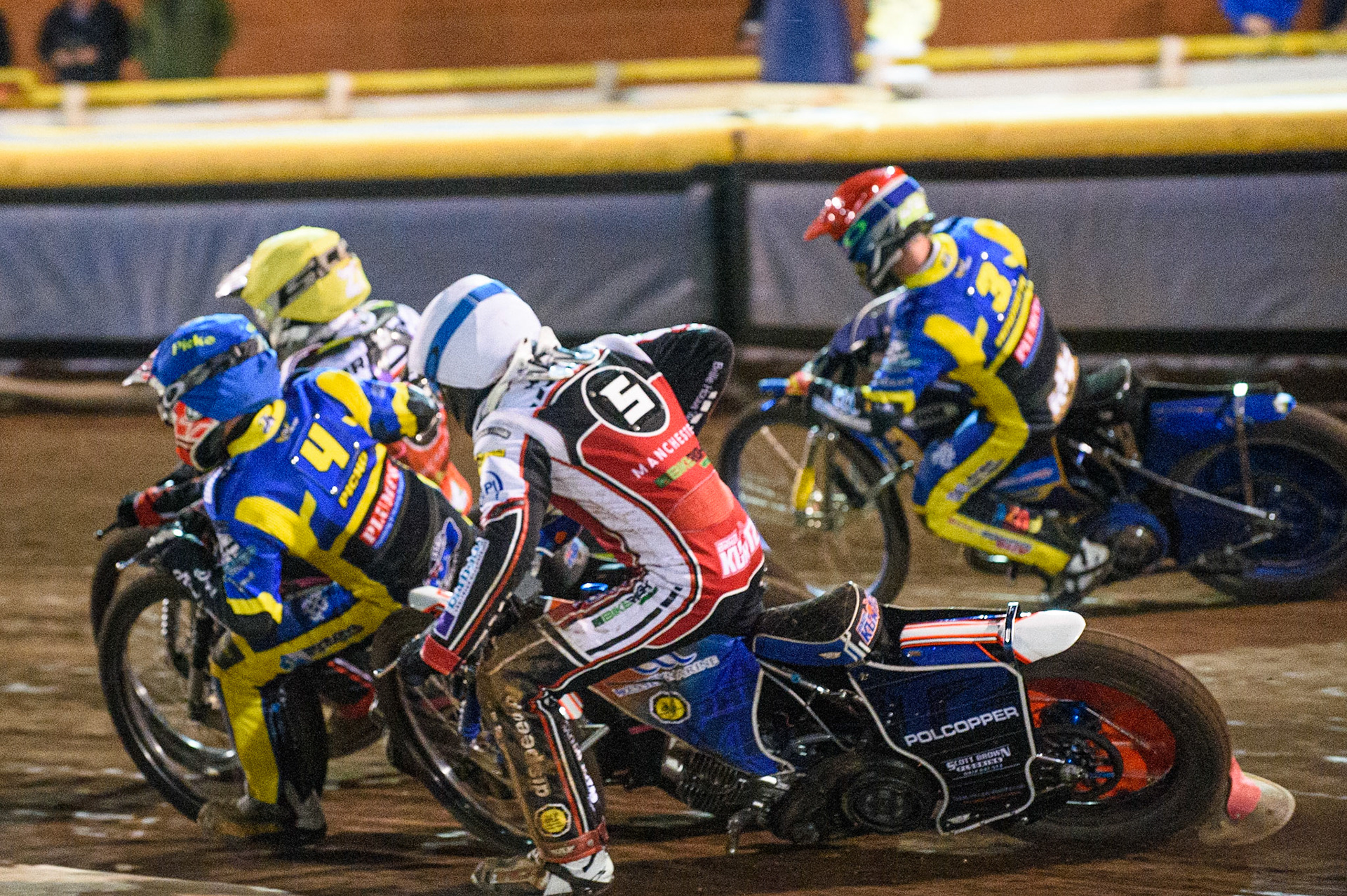 SHEFFIELD, UK. AUG 2NDBrady Kurtz  (White) is shut down on the first turn by Josh Pickering   (Blue) during the SGB Premiership match between Sheffield Tigers and Belle Vue Aces at Owlerton Stadium, Sheffield on Thursday 2nd September 2021. (Credit: Ian Charles | MI News)