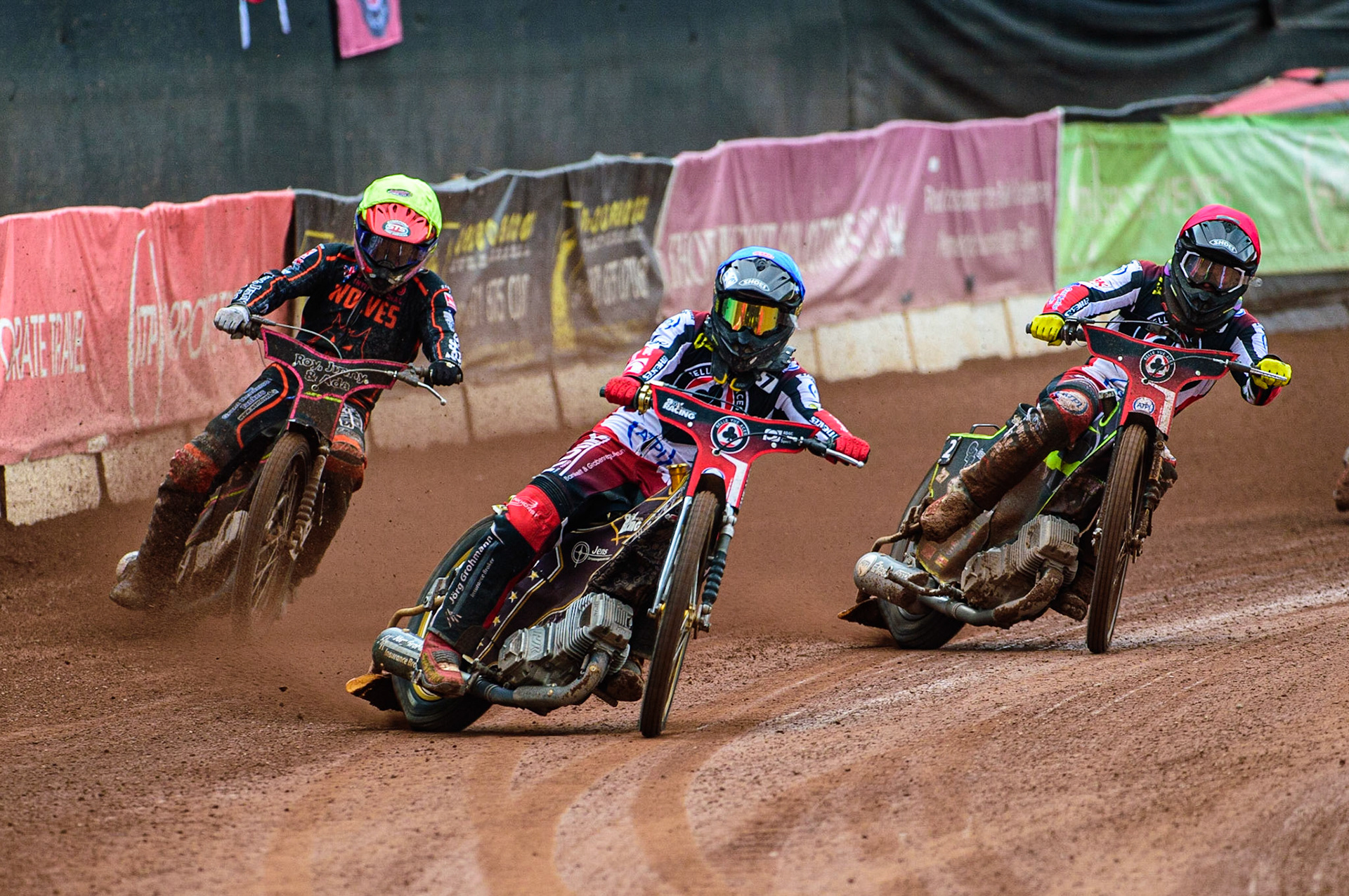 Norick Blödorn  (Blue) leads team mate Tom Brennan (Red) and Leon Flint  (Yellow) during the SGB Premiership match between Belle Vue Aces and Wolverhampton Wolves at the National Speedway Stadium, Manchester on Monday 29th August 2022. (Credit: Ian Charles | MI News)