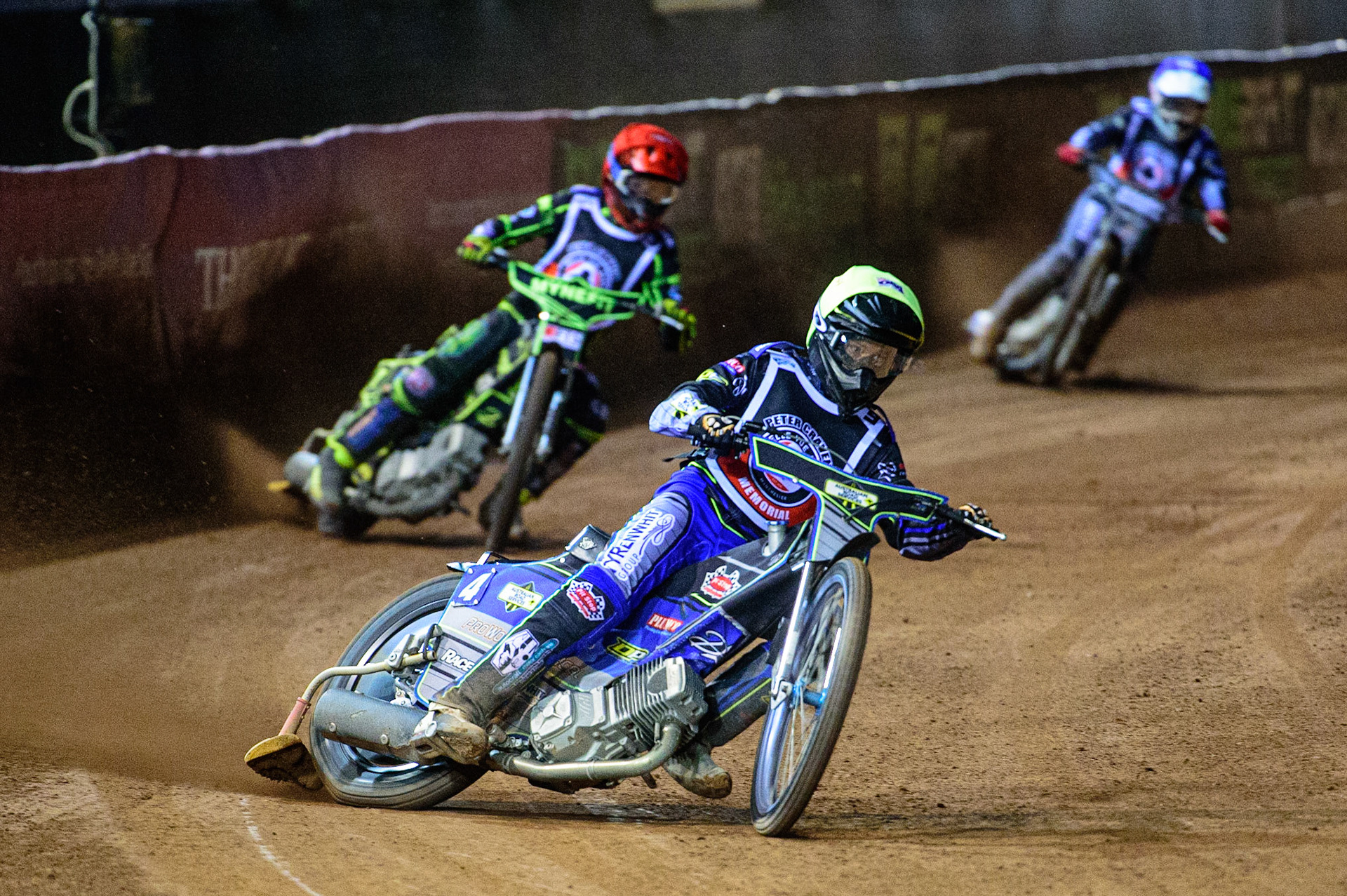 MANCHESTER, UK. OCT 23RD  Ryan Douglas  (Yellow) leads Jye Etheridge  (Red) and Broc Nicol  (Blue) during the Peter Craven Memorial Trophy event at the National Speedway Stadium, Manchester on Saturday 23rd October 2021. (Credit: Ian Charles | MI News)