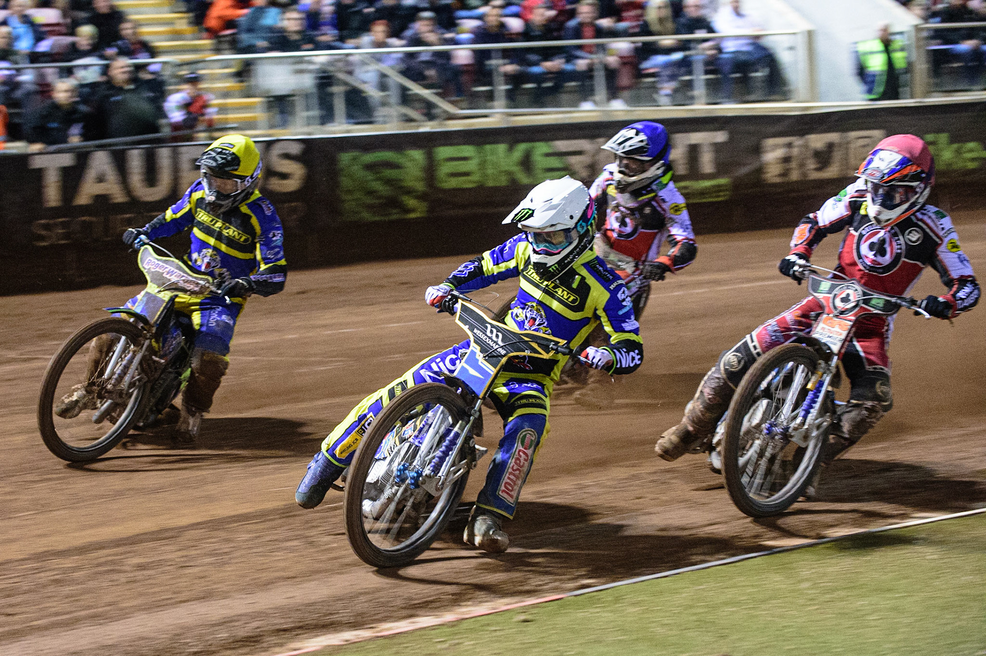 MANCHESTER, UK. OCT 7TH  Jack Holder  (White) and Troy Batchelor  (Yellow) get maximum points from Steve Worrall   (Red) and Tom Brennan  (Blue) during the SGB Premiership Play off Semi-Final Second Leg between Belle Vue Aces and Sheffield Tigers at the National Speedway Stadium, Manchester on Thursday 7th October 2021. (Credit: Ian Charles | MI News)