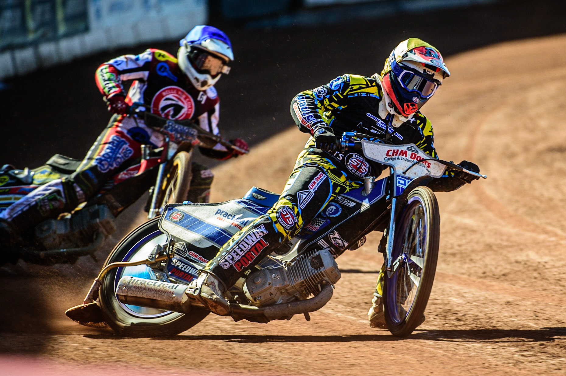 Danny Phillips  (Yellow) leads Paul Bowen (Blue) during the National Development League match between Belle Vue Colts and Berwick Bullets at the National Speedway Stadium, Manchester on Friday 7th April 2023. (Photo: Ian Charles | MI News)