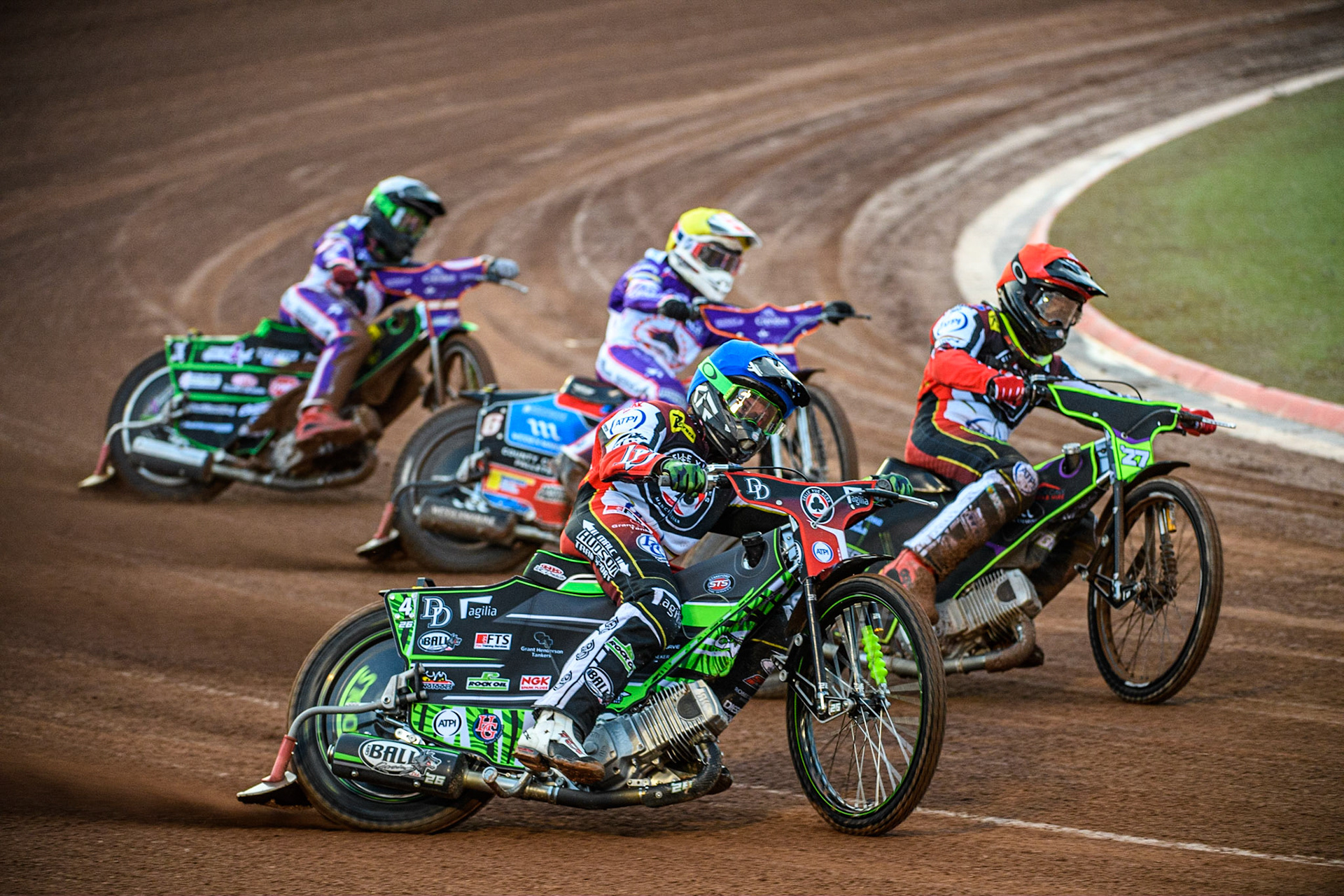 Charles Wright  (Blue) and Tom Brennan  (Red) lead Ben Cook  (Yellow) and Benjamin Basso  (White) during the SGB Premiership match between Belle Vue Aces and Peterborough at the National Speedway Stadium, Manchester on Monday 24th April 2023. (Photo: Ian Charles | MI News)