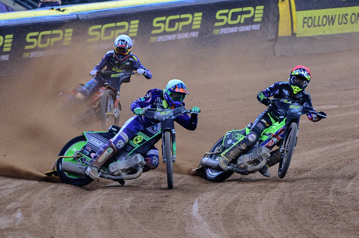 Daniel Klima (Czech Republic) (Yellow) goes outside Tom Brennan (Great Britain) with Drew Kemp (Great Britain)  (White) behind during the FIM  Speedway Grand Prix  2 of Great Britain at the Principality Stadium, Cardiff on Sunday 14th August 2022. (Credit: Ian Charles | MI News)
