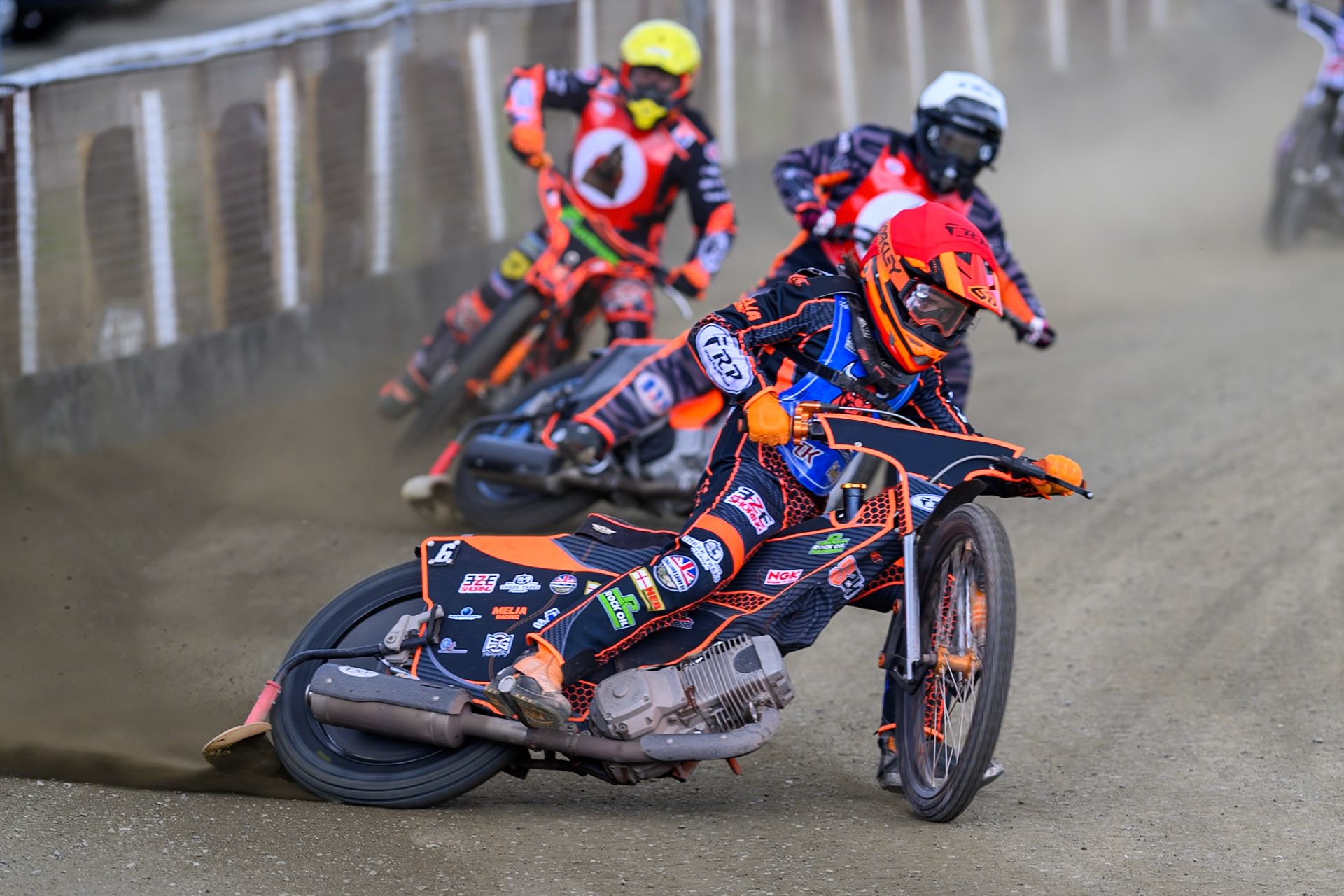 Jack Smith of Buxton Bulls   in Red leading Jack Roberts of NDL Nomads    in White and Alex Spooner of NDL Nomads   in Yellow during the  Challenge match between Buxton Bulls and NDL Nomads at Hi-Edge Speedway, Buxton on Sunday 19th April 2026. (Photo: Ian Charles | MI News)